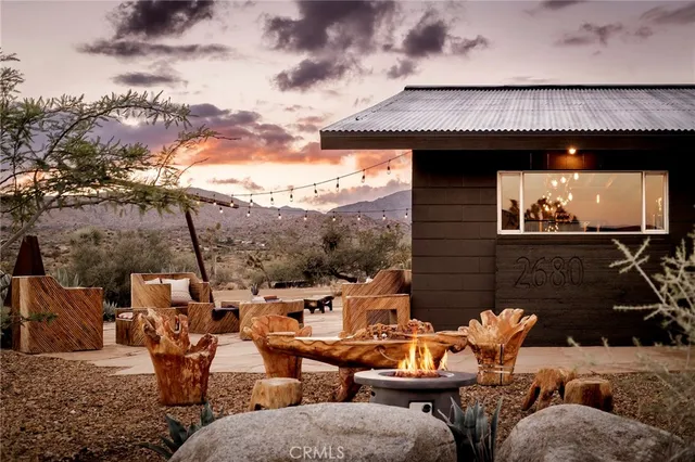 an outdoor space with patio furniture