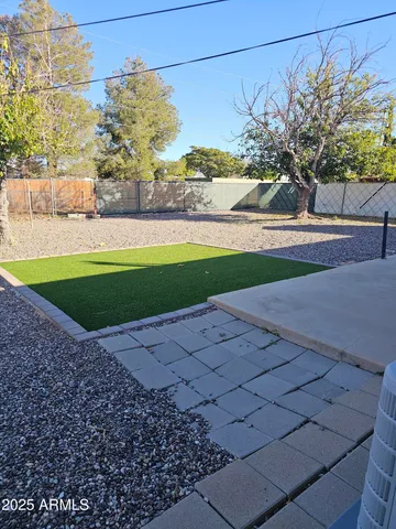 a view of a road with an ocean view