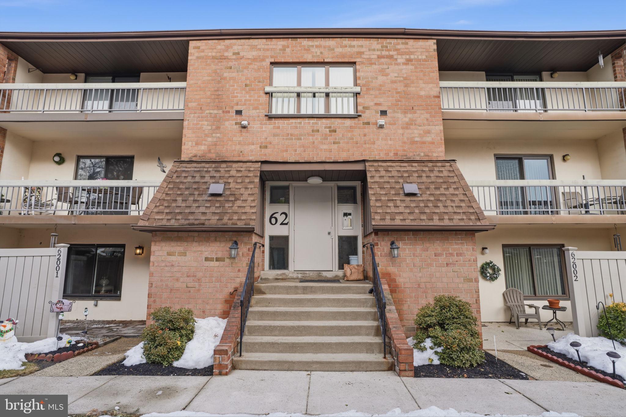 a front view of a house with a outdoor space