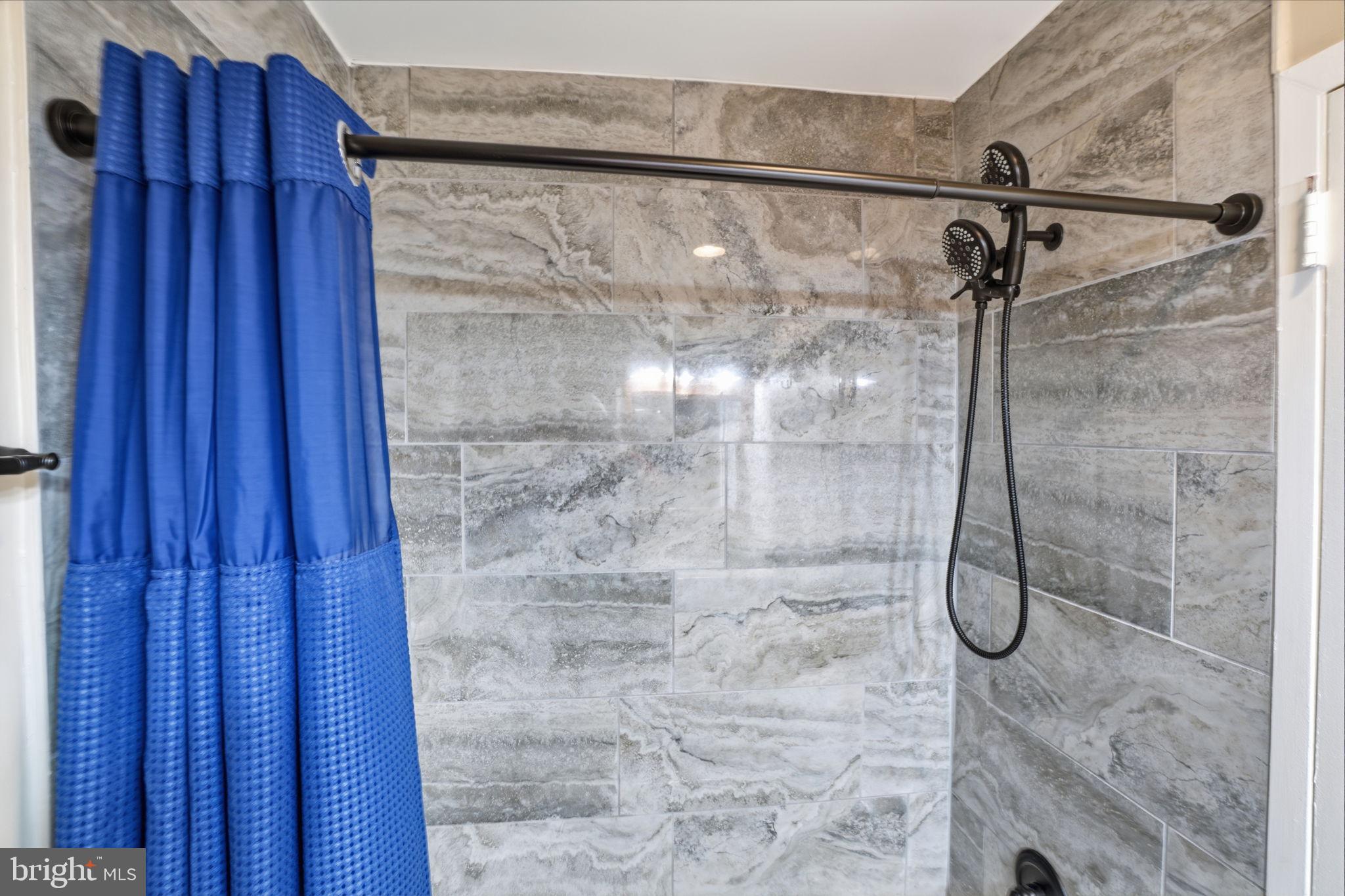 62204 Delaire Landing Road, Unit 204 Philadelphia, PA 19114 - Photo 13 of 29 a bathroom with a shower