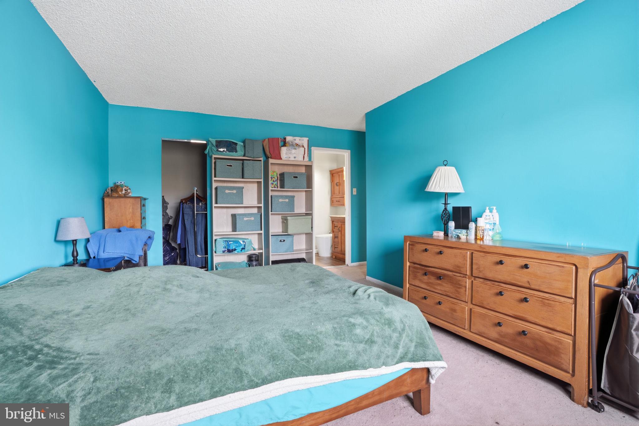 62204 Delaire Landing Road, Unit 204 Philadelphia, PA 19114 - Photo 14 of 35 a bedroom with a bed and a closet