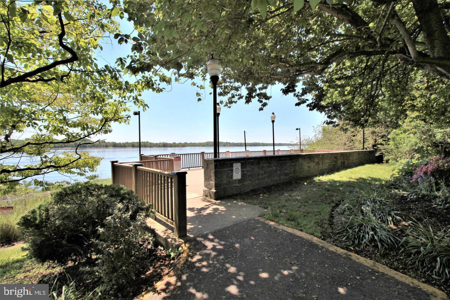 62204 Delaire Landing Road, Unit 204 Philadelphia, PA 19114 - Photo 21 of 29 a view of a garden with wooden stairs