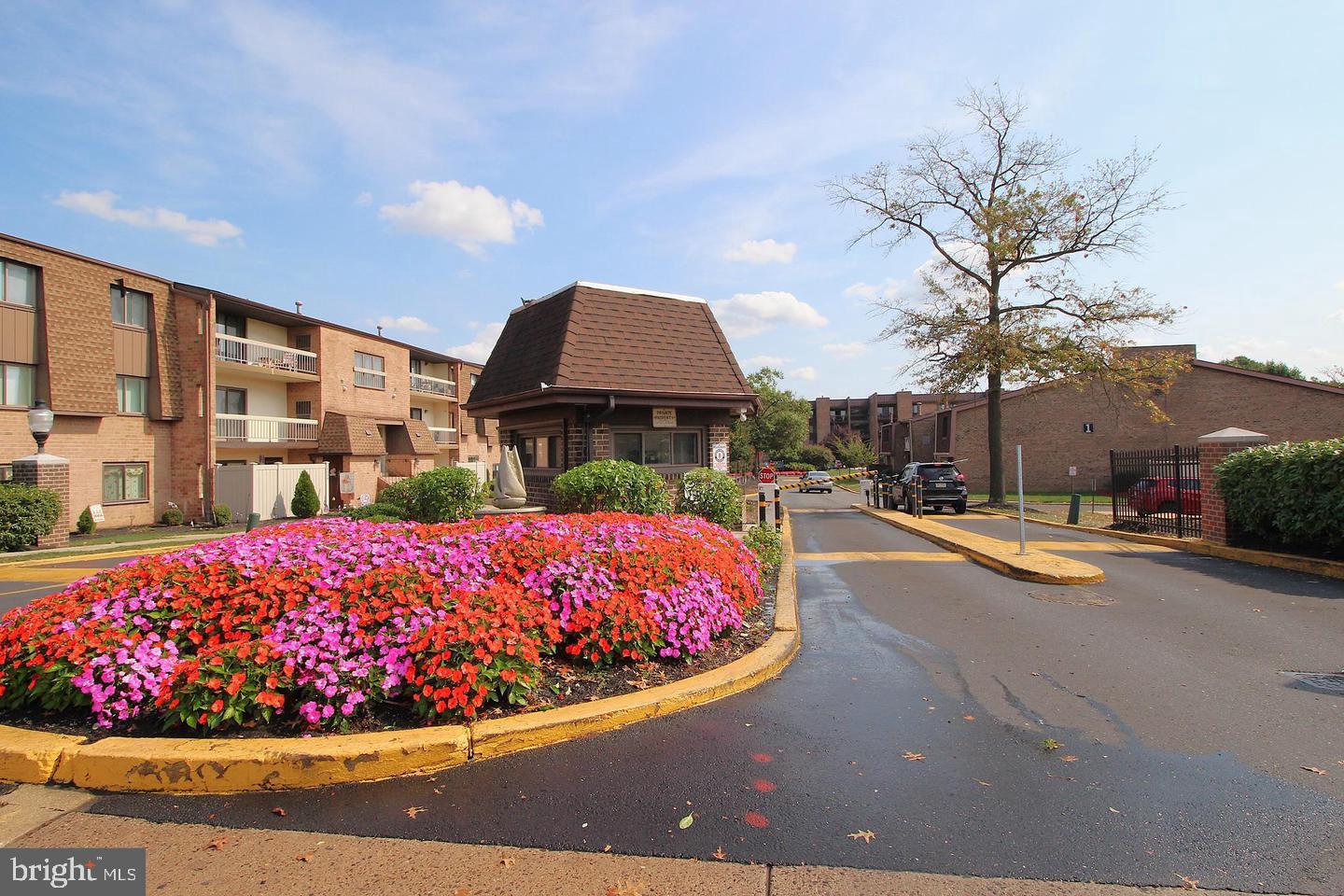62204 Delaire Landing Road, Unit 204 Philadelphia, PA 19114 - Photo 3 of 29 a view of a house with swimming pool and porch