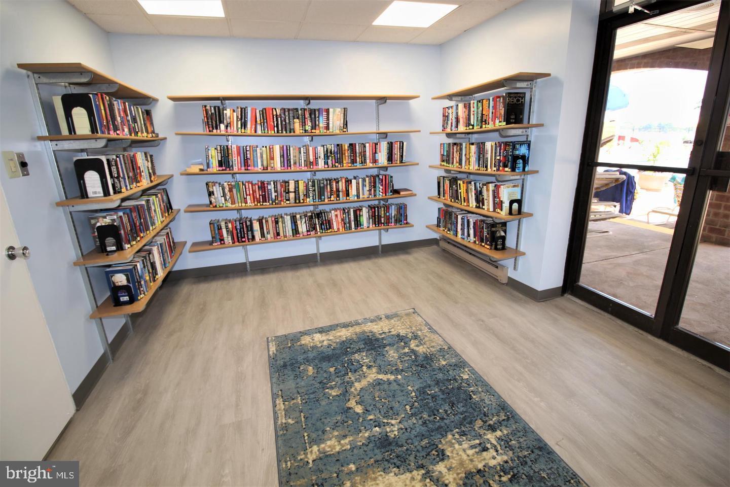 62204 Delaire Landing Road, Unit 204 Philadelphia, PA 19114 - Photo 33 of 35 a view of room with furniture and book shelf