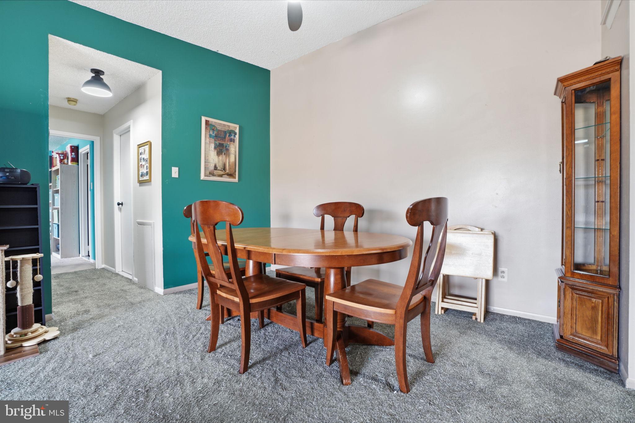 62204 Delaire Landing Road, Unit 204 Philadelphia, PA 19114 - Photo 7 of 29 a dining room with furniture and entryway