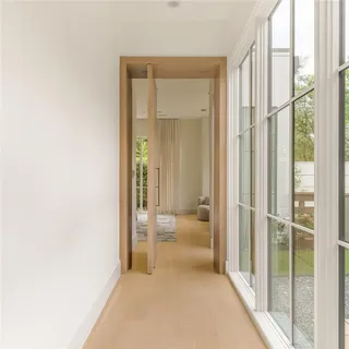 a view of a bathroom with a glass door and a shower