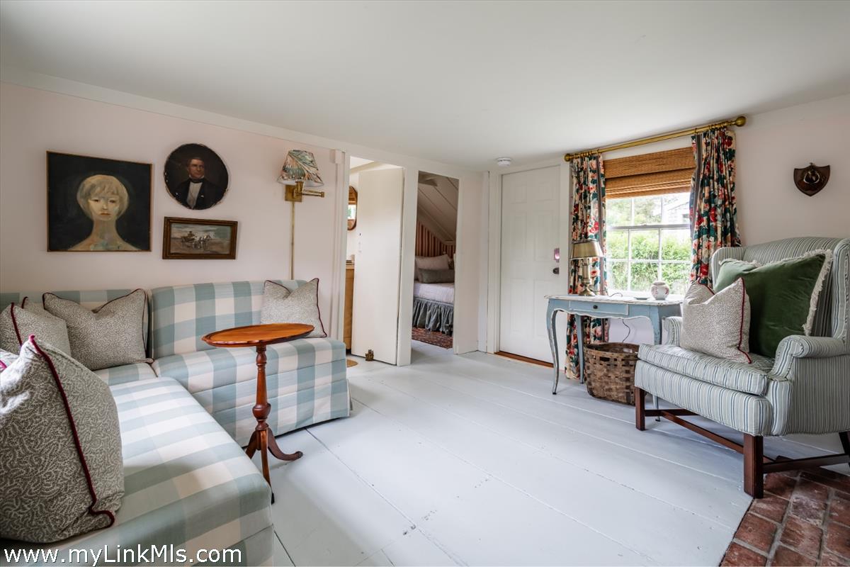 10 Centre Street Nantucket, MA 02554 - Photo 20 of 43 a living room with furniture and a window