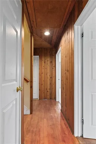 a view of hallway with natural light