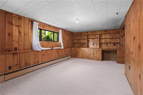 a view of a livingroom with furniture