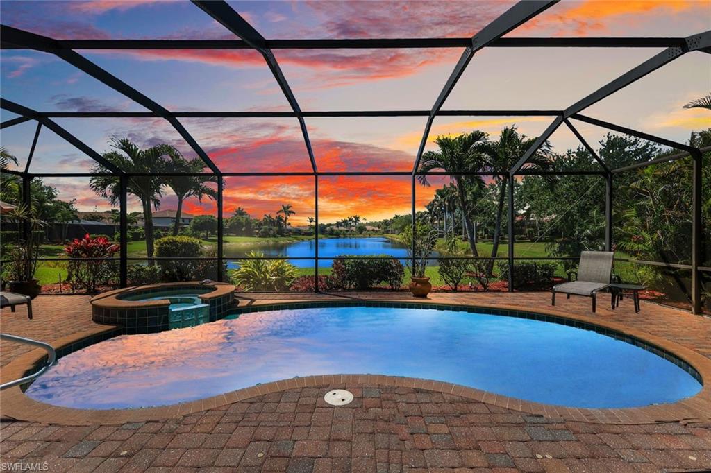 3917 Sapphire Way Naples, FL 34114 - Photo 32 of 44 a view of outdoor space with swimming pool