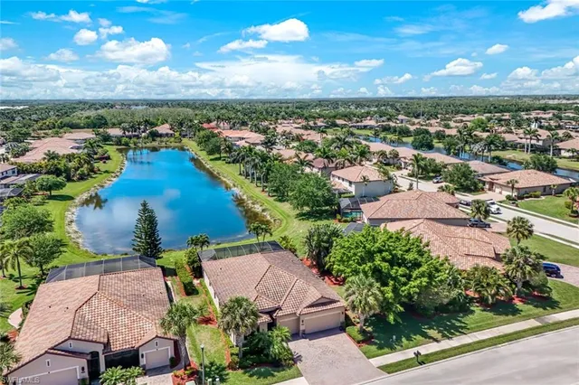 an aerial view of a house with outdoor space