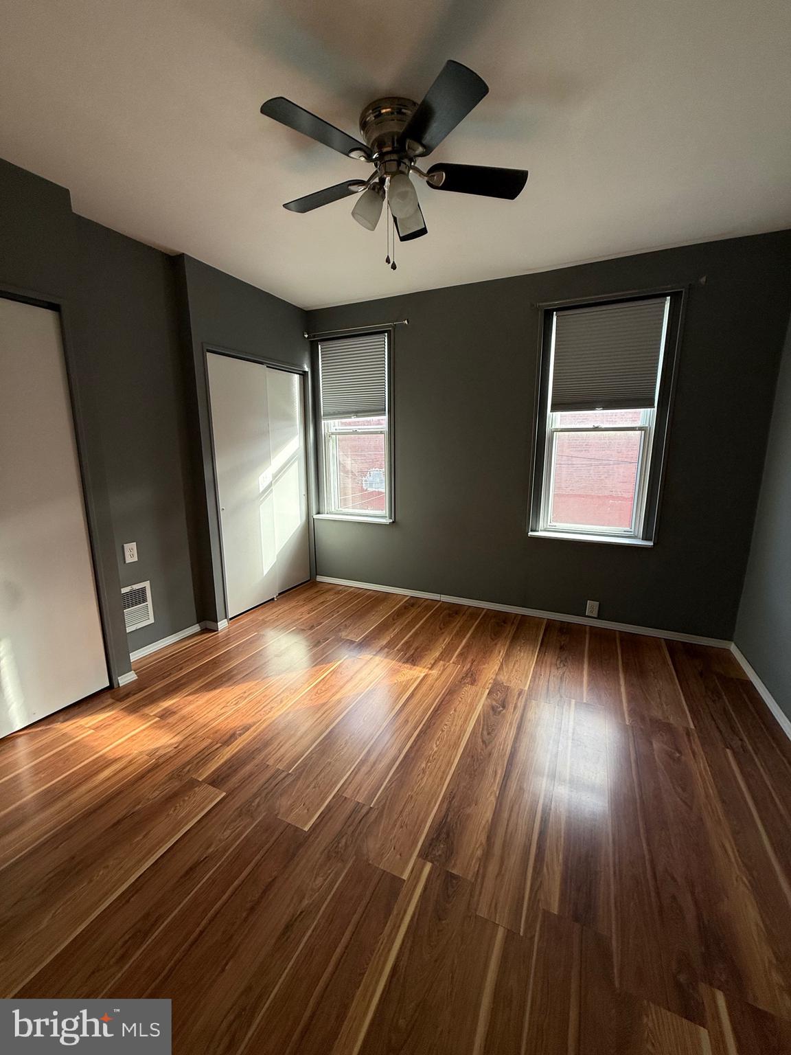 3146 Mercer Street Philadelphia, PA 19134 - Photo 14 of 22 wooden floor in an empty room with a window