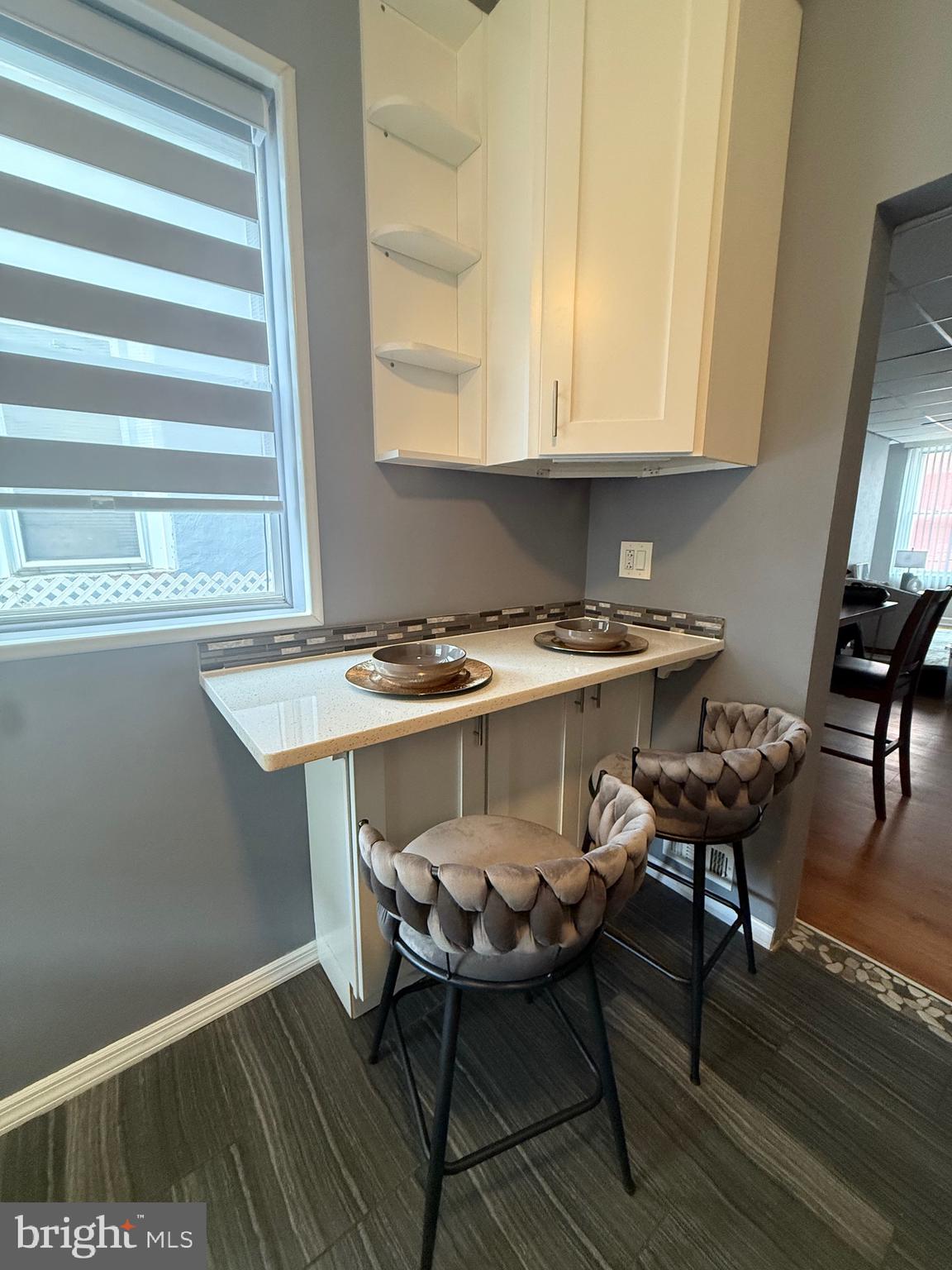 3146 Mercer Street Philadelphia, PA 19134 - Photo 20 of 22 a view of a dining room with furniture and wooden floor