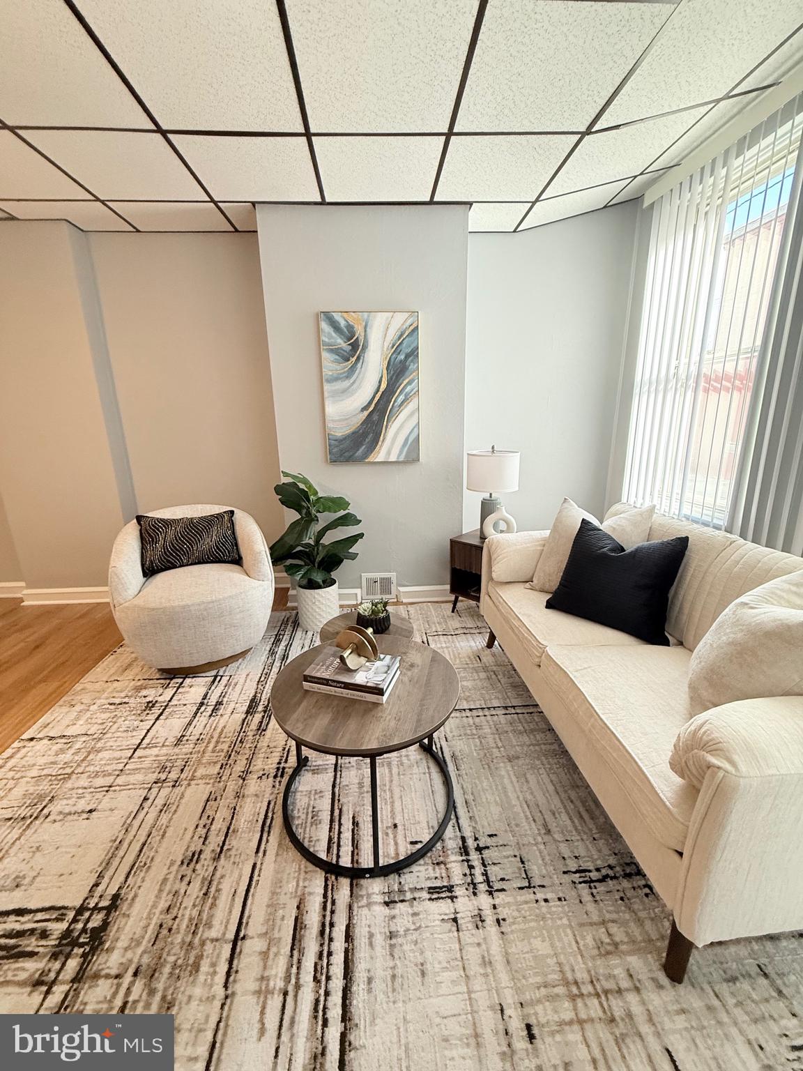 3146 Mercer Street Philadelphia, PA 19134 - Photo 2 of 22 a living room with furniture and wooden floor