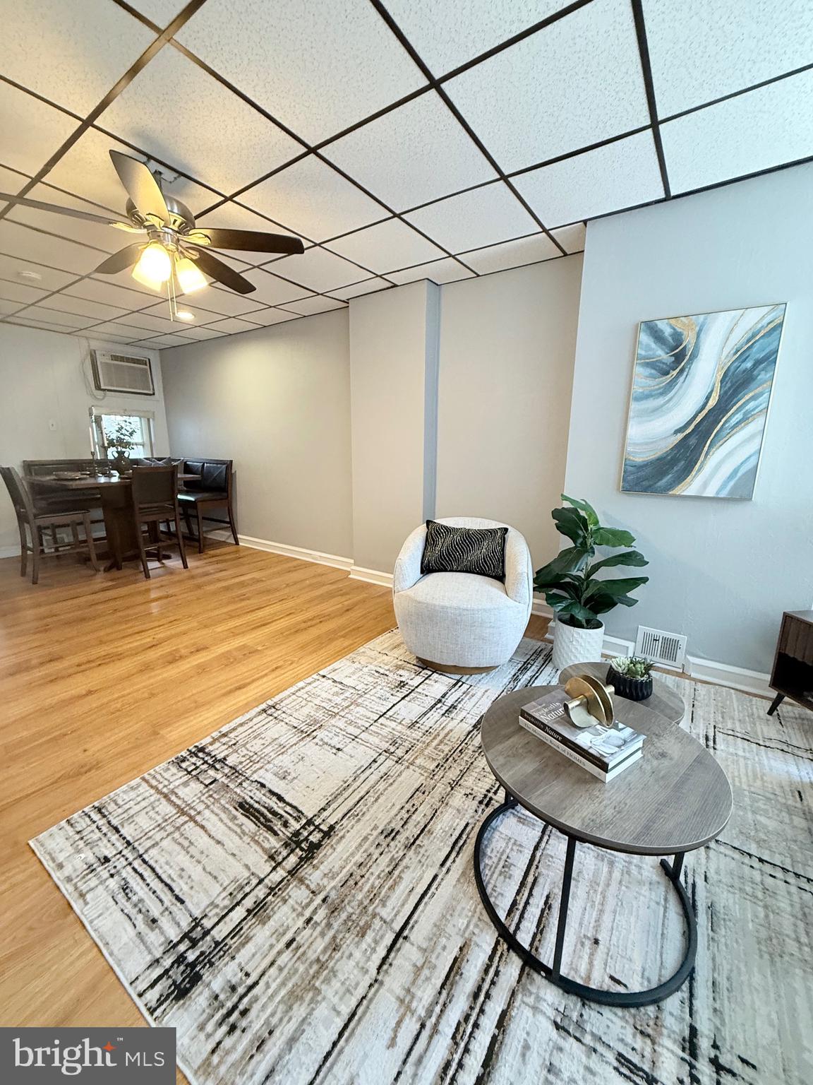 3146 Mercer Street Philadelphia, PA 19134 - Photo 6 of 22 a bedroom with a bed and a table