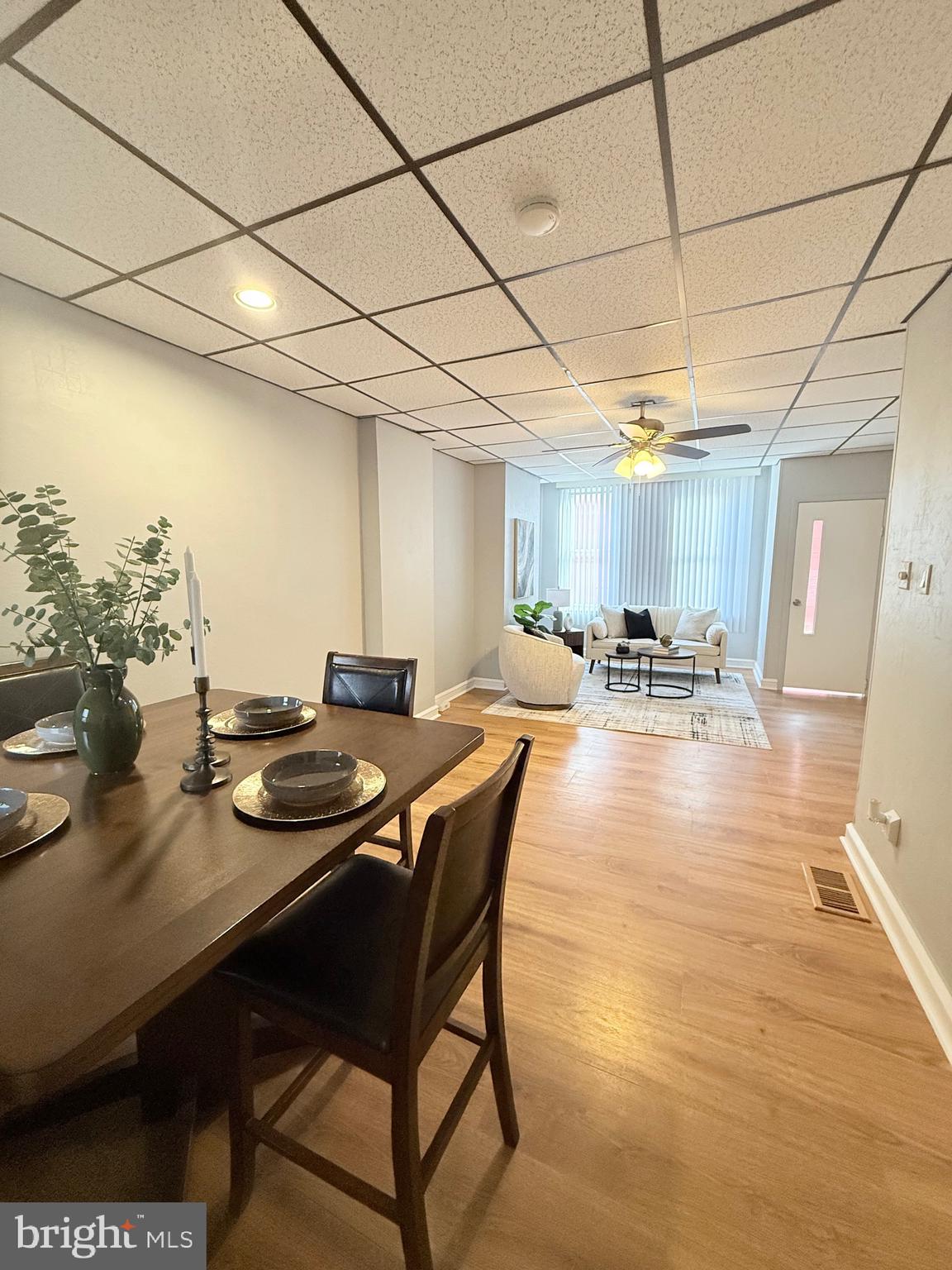 3146 Mercer Street Philadelphia, PA 19134 - Photo 8 of 22 a living room with furniture and a table