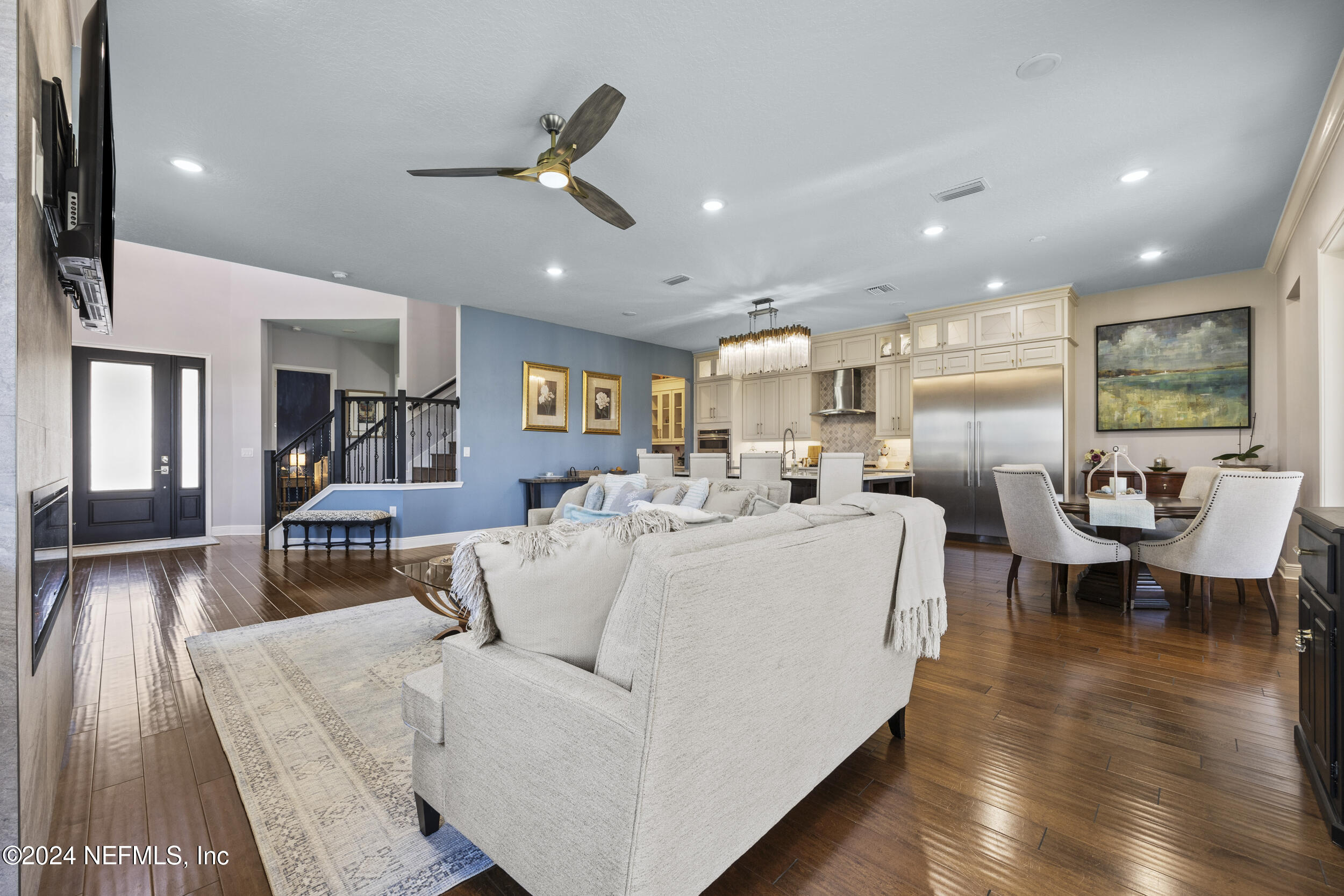 228 Rum Runner Way St. Johns, FL 32259 - Photo 13 of 97 a living room with furniture and a wooden floor