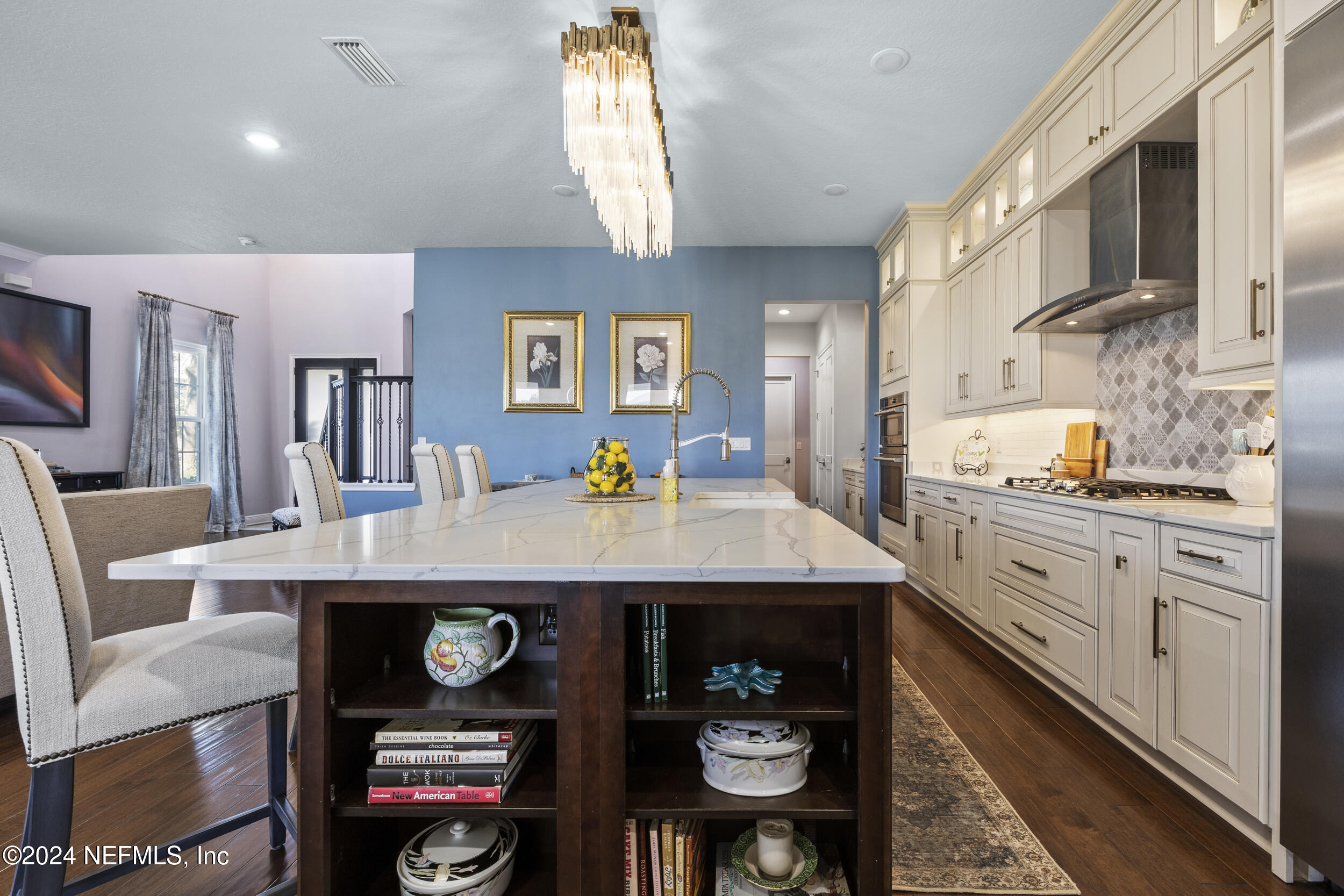 228 Rum Runner Way St. Johns, FL 32259 - Photo 24 of 97 a kitchen with stainless steel appliances granite countertop a sink and cabinets