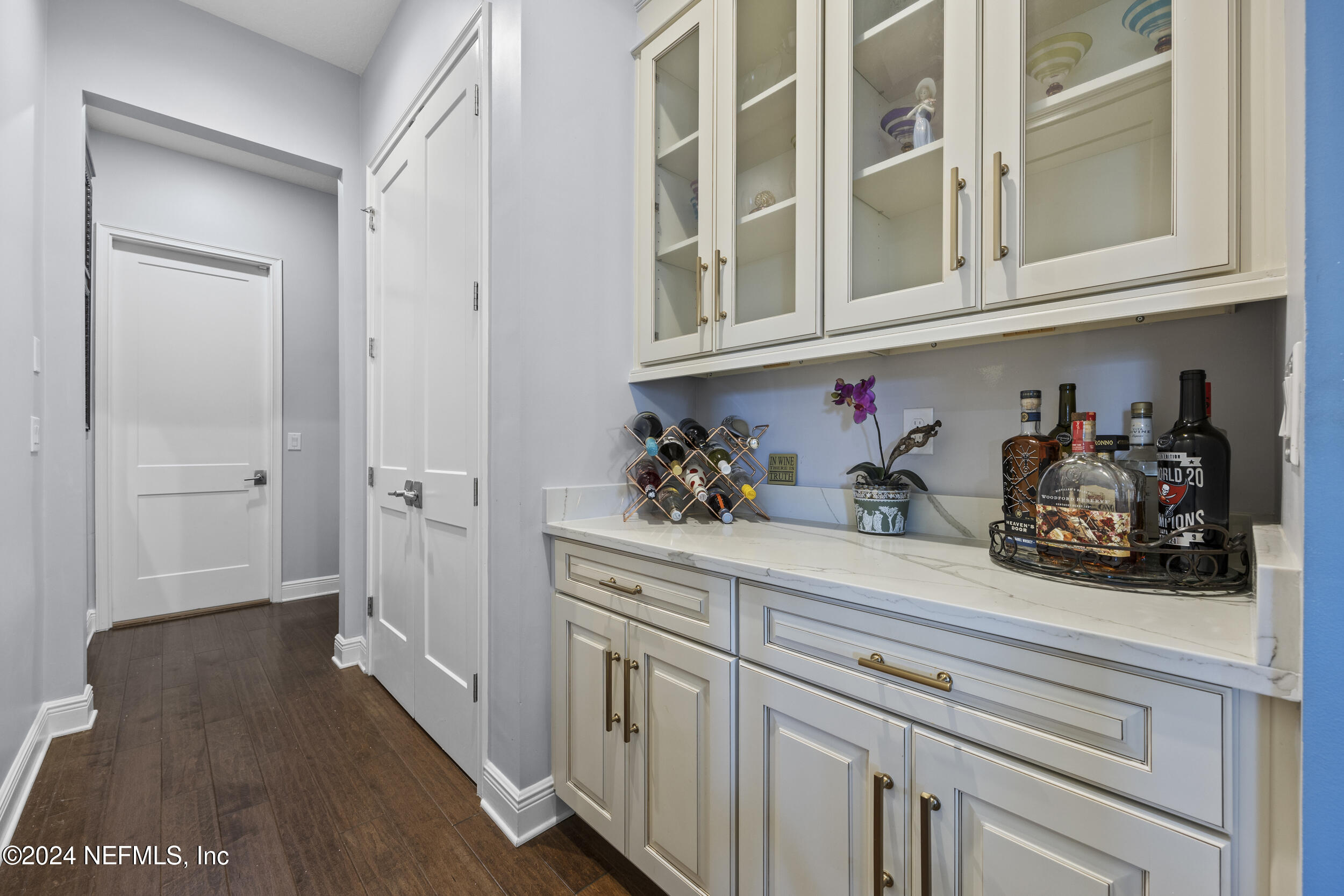 228 Rum Runner Way St. Johns, FL 32259 - Photo 25 of 97 a kitchen with cabinets and a wooden floor