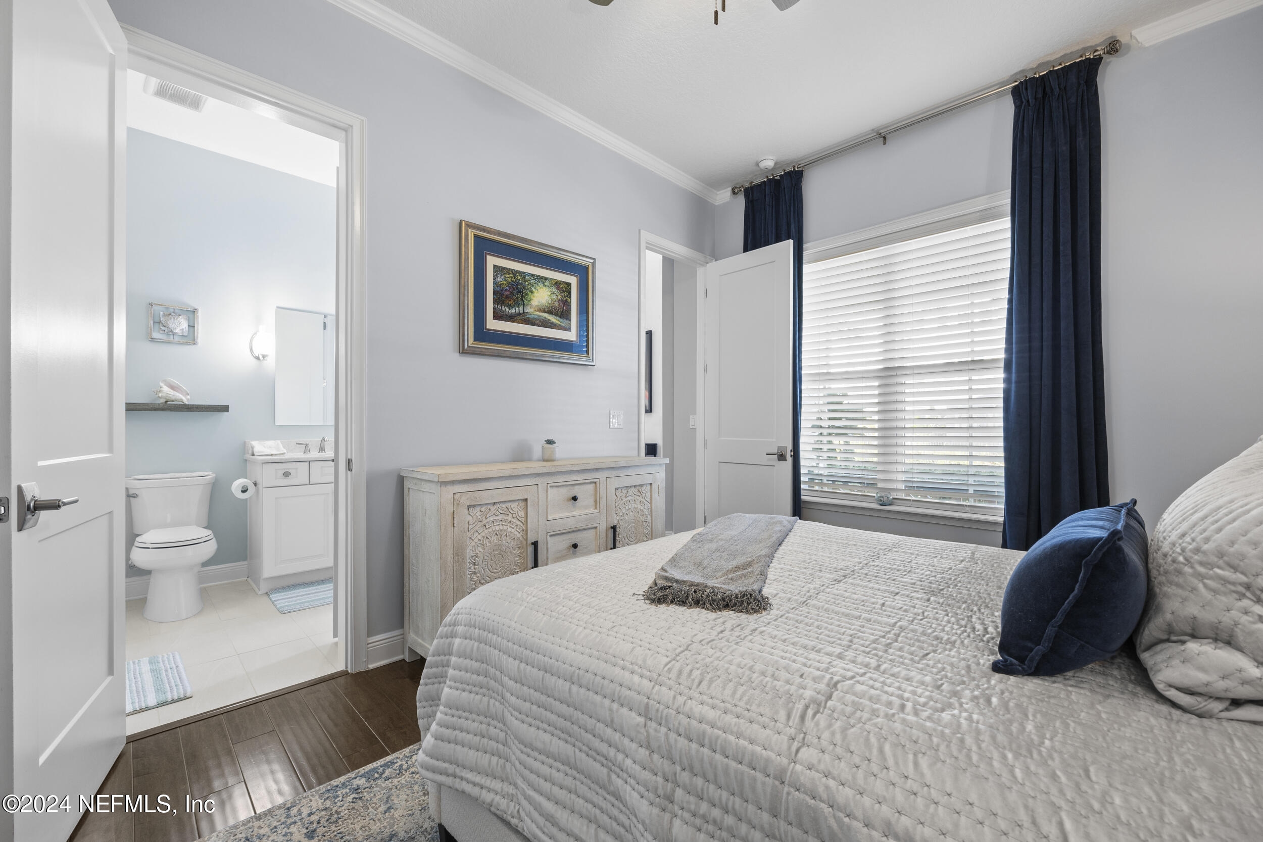 228 Rum Runner Way St. Johns, FL 32259 - Photo 29 of 97 a bedroom with a bed and a view of bathroom