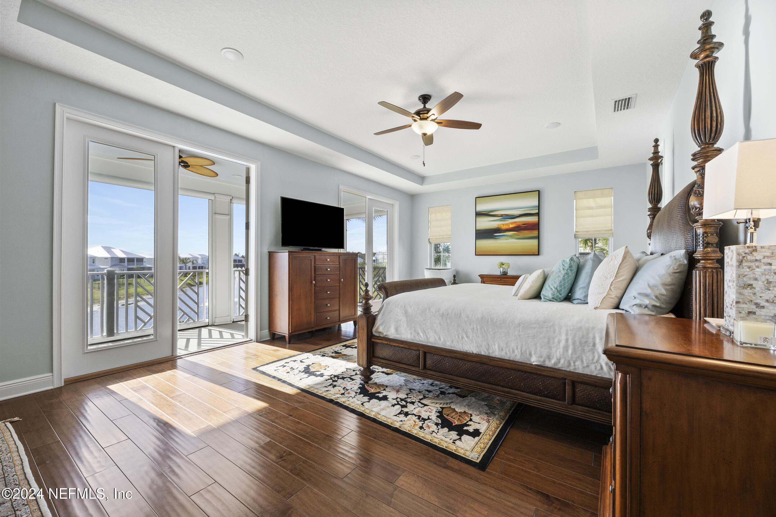 228 Rum Runner Way St. Johns, FL 32259 - Photo 36 of 97 a living room with furniture fireplace and a flat screen tv