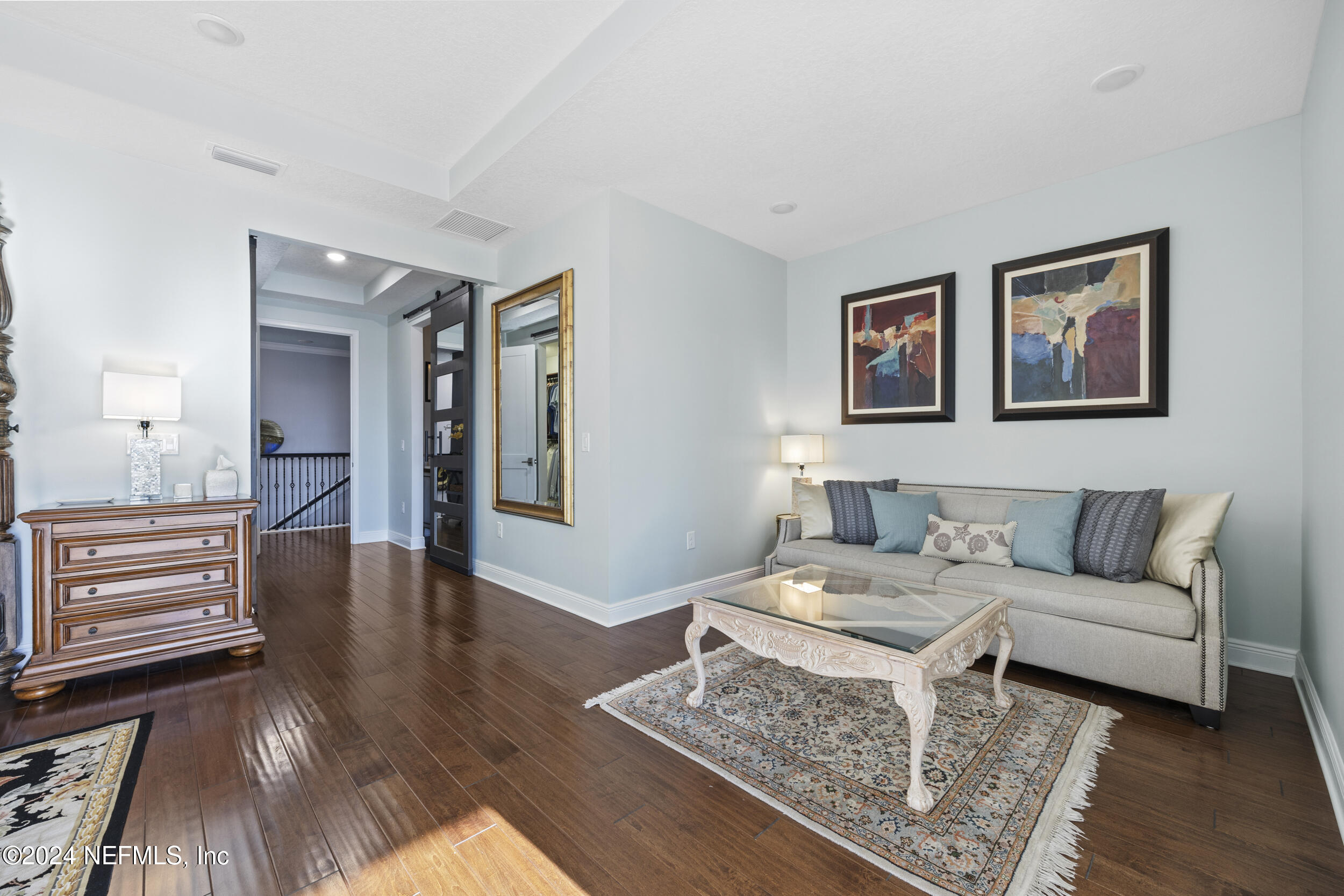 228 Rum Runner Way St. Johns, FL 32259 - Photo 38 of 97 a living room with furniture and wooden floor