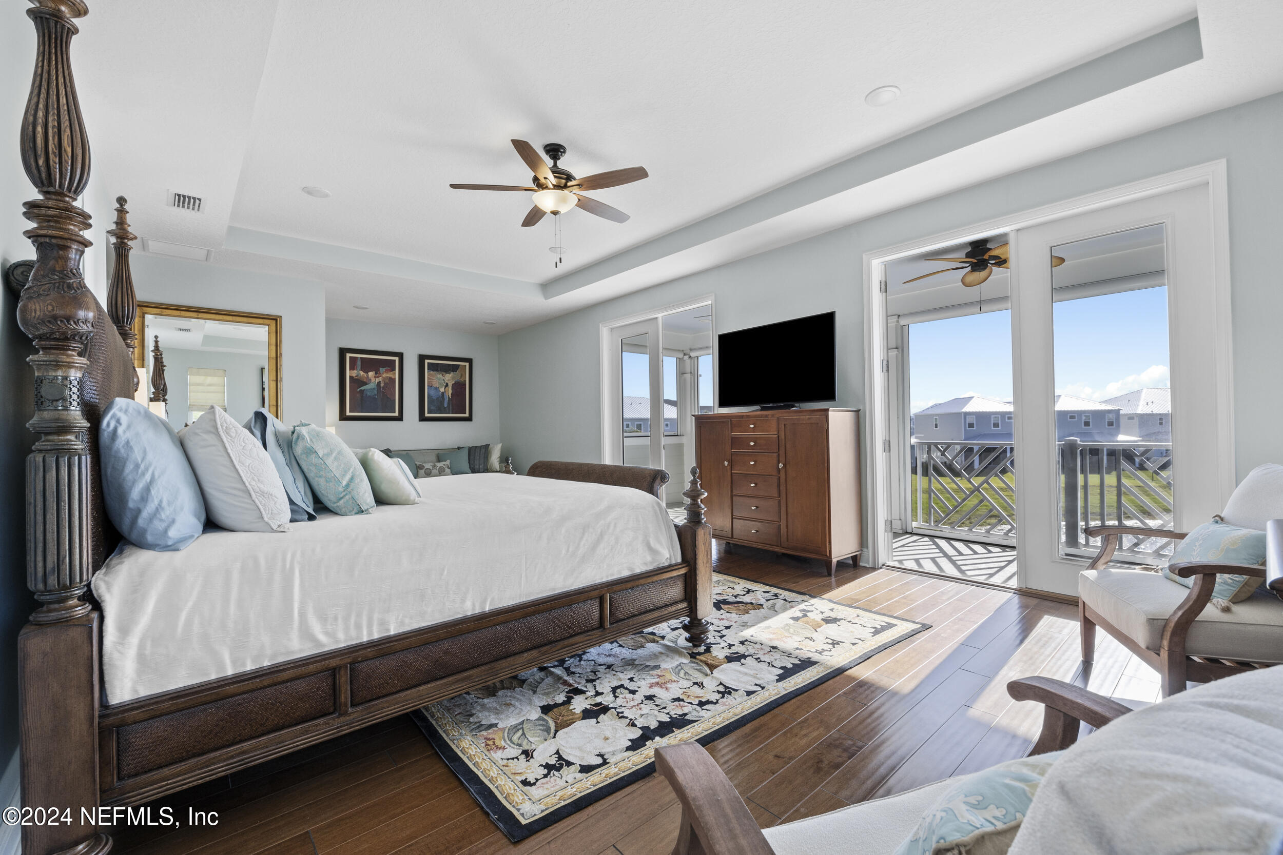 228 Rum Runner Way St. Johns, FL 32259 - Photo 40 of 97 a living room with furniture and a flat screen tv