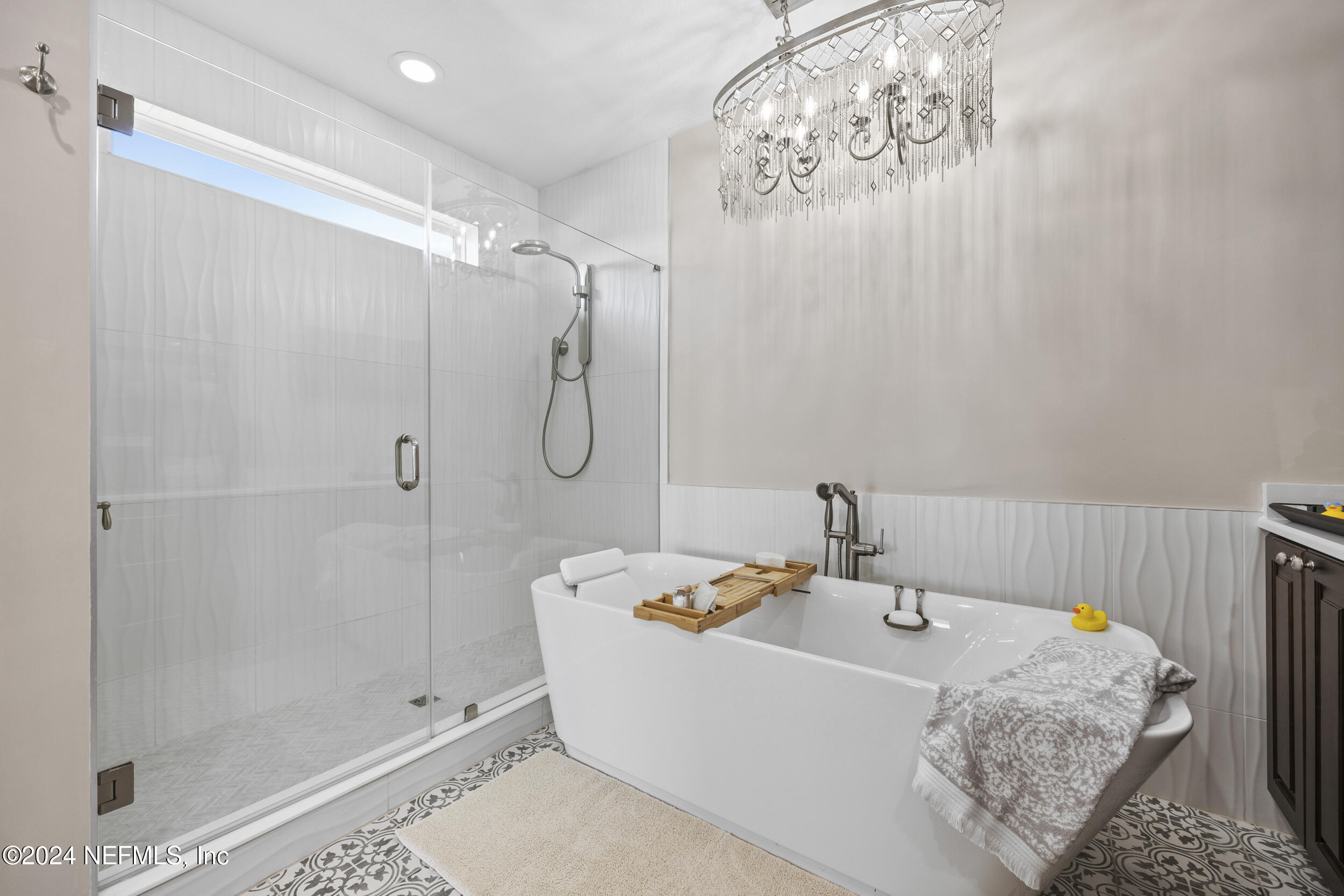 228 Rum Runner Way St. Johns, FL 32259 - Photo 46 of 97 a bathroom with a sink and shower