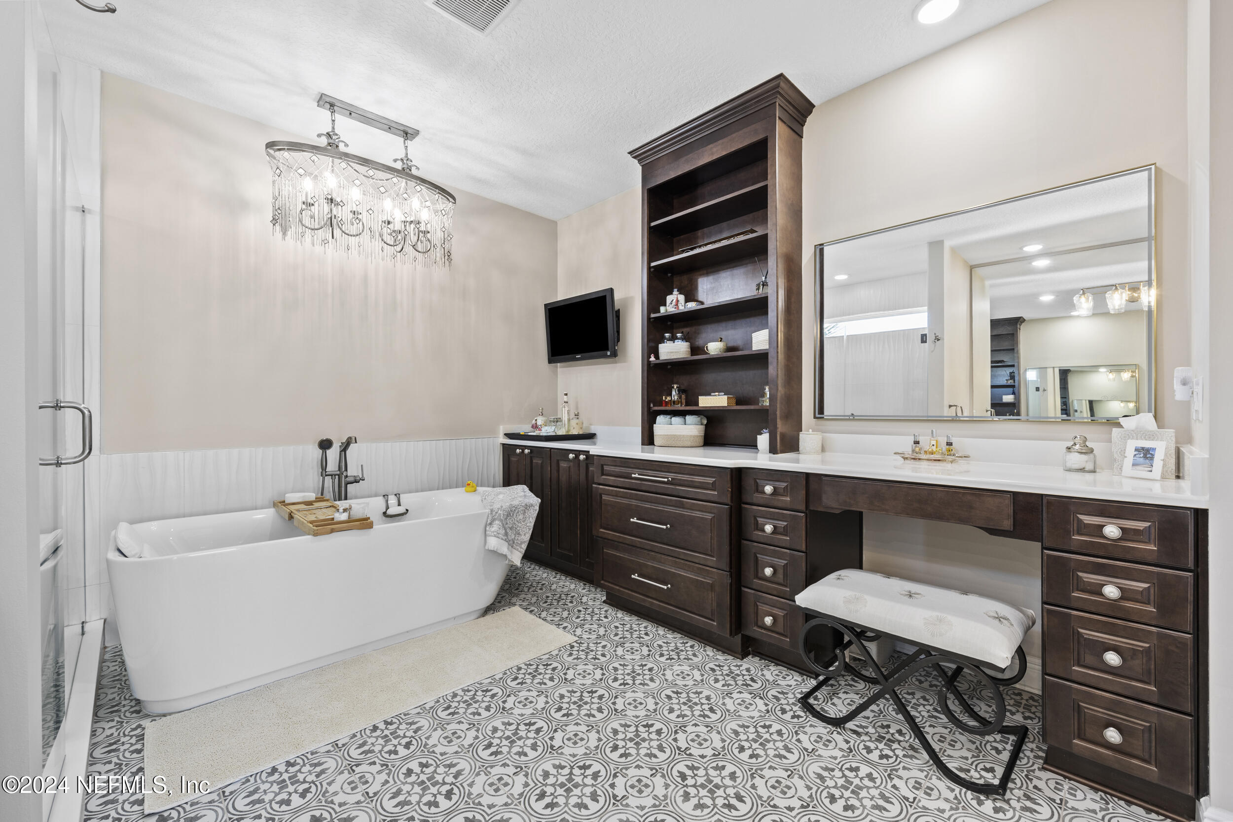 228 Rum Runner Way St. Johns, FL 32259 - Photo 47 of 97 a bathroom with a sink mirror and a toilet