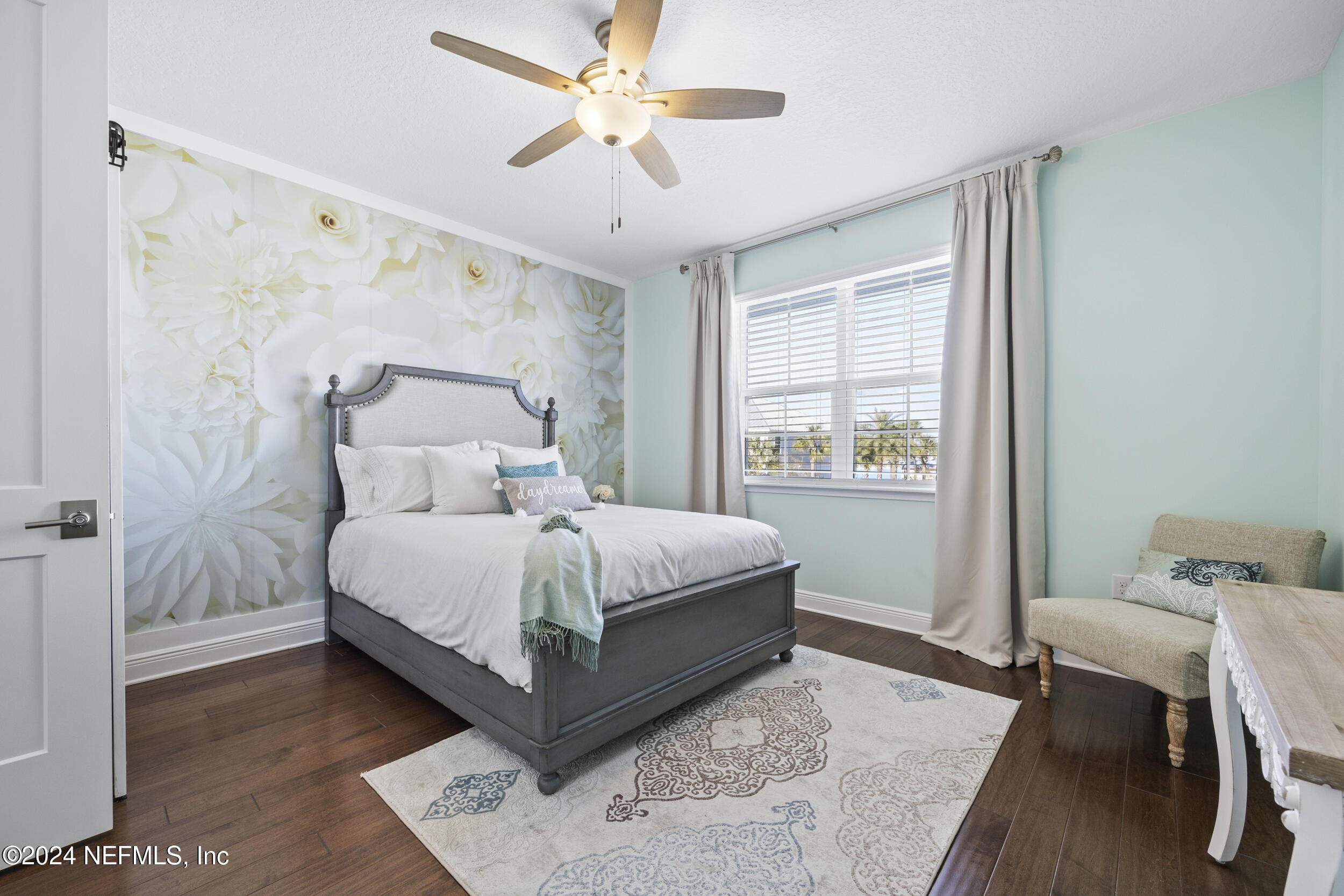 228 Rum Runner Way St. Johns, FL 32259 - Photo 52 of 97 a bedroom with a bed and a window