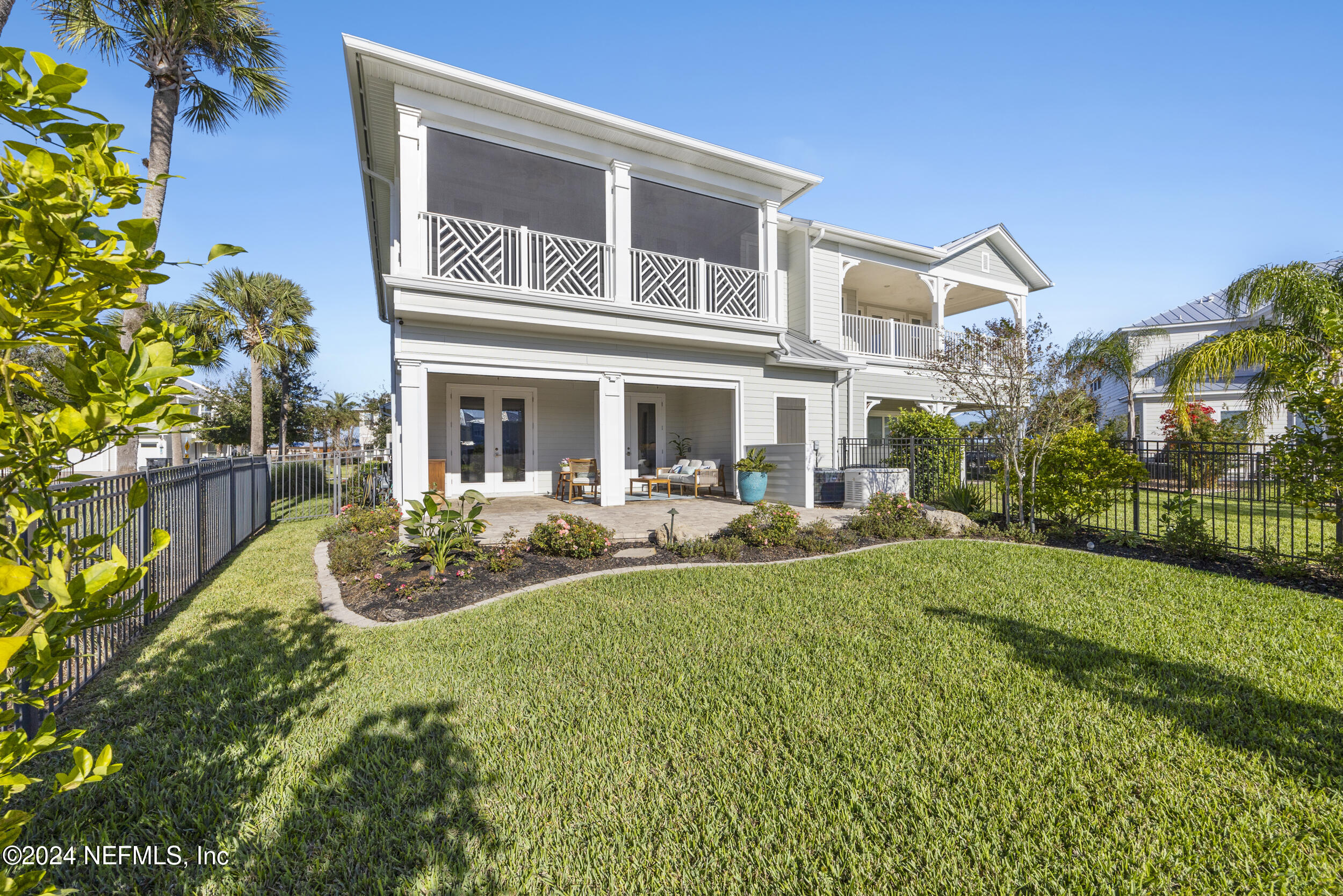 228 Rum Runner Way St. Johns, FL 32259 - Photo 62 of 97 a view of a house with backyard porch and sitting area