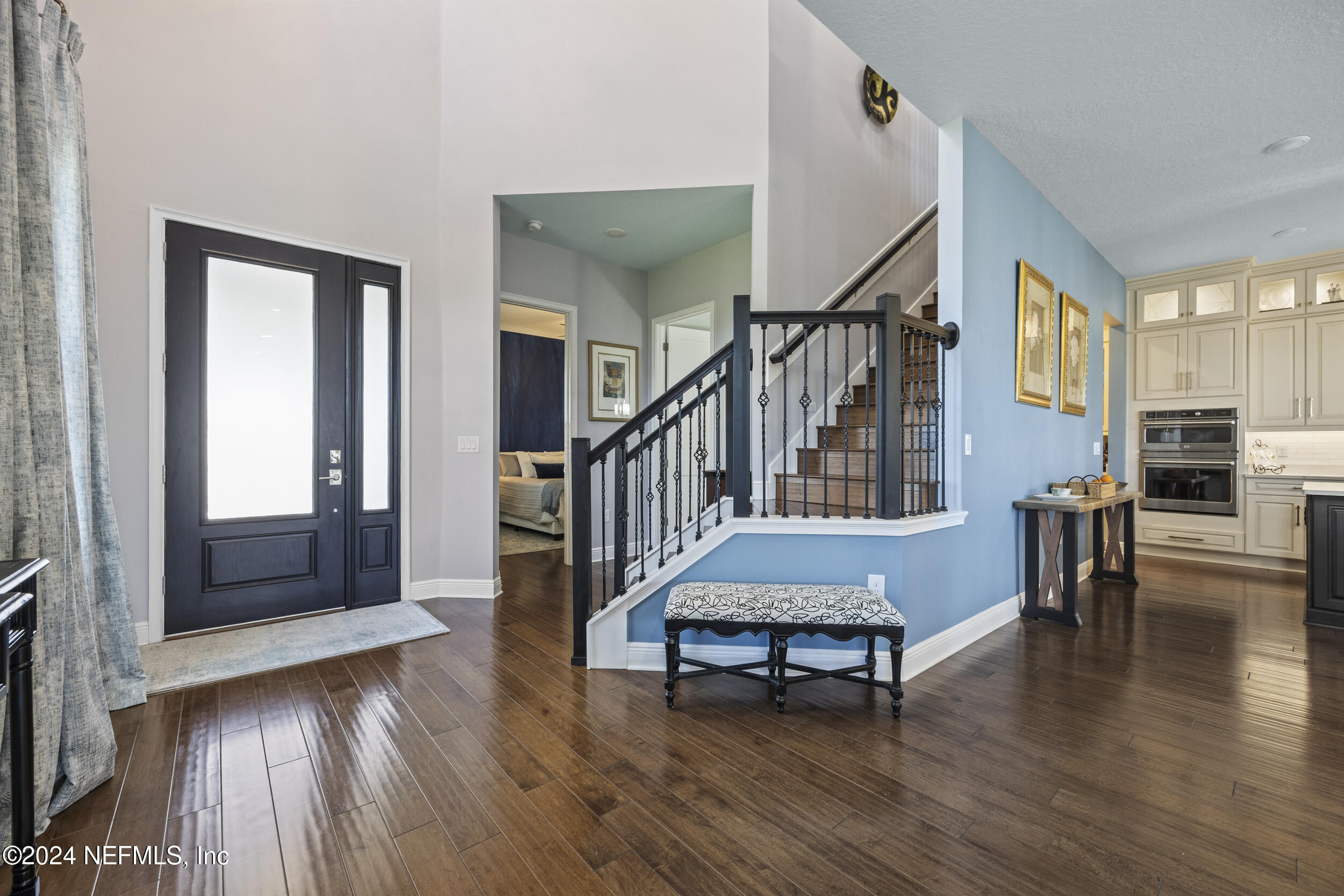 228 Rum Runner Way St. Johns, FL 32259 - Photo 8 of 97 a living room with furniture and a wooden floor