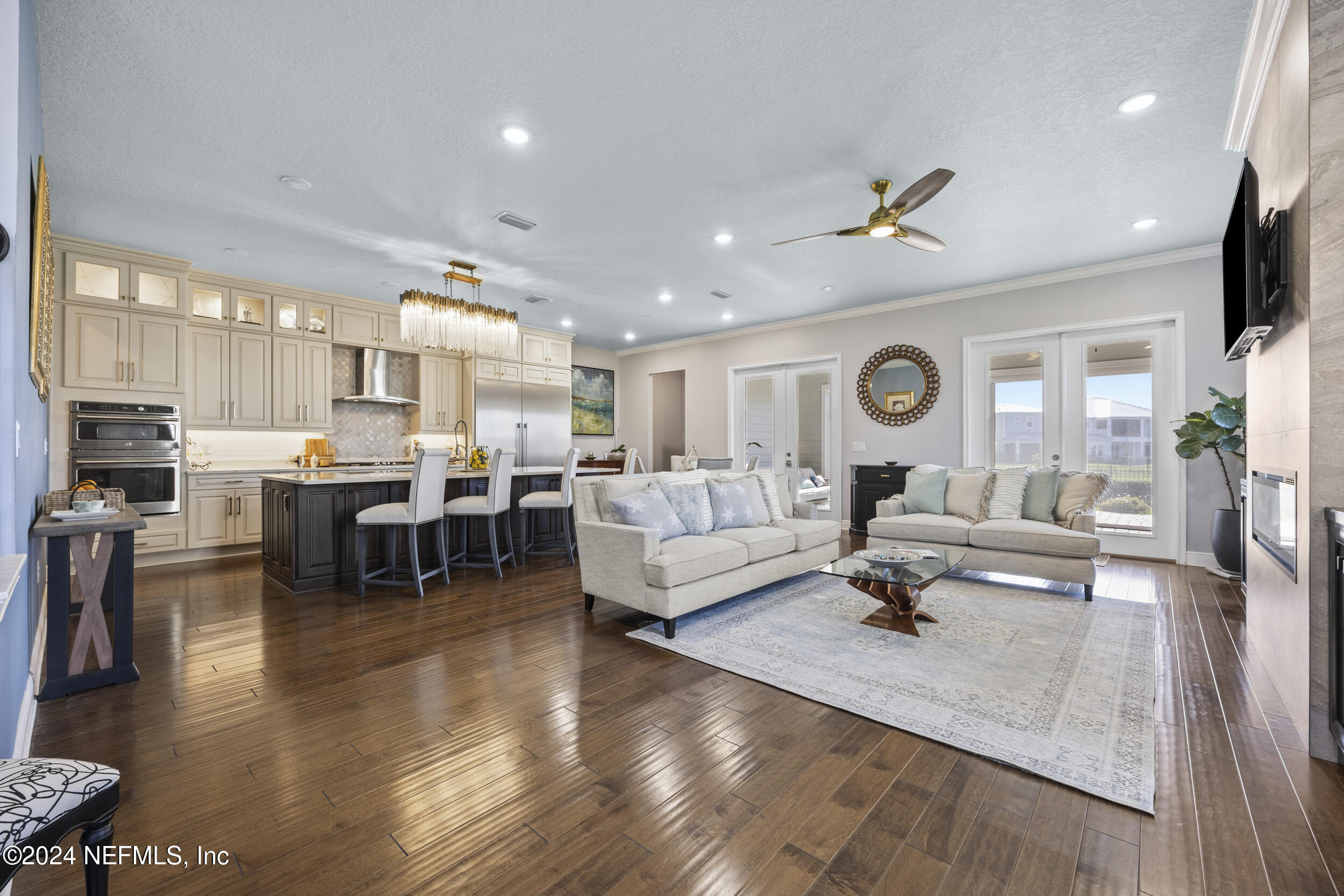 228 Rum Runner Way St. Johns, FL 32259 - Photo 9 of 97 a living room with furniture and a large window