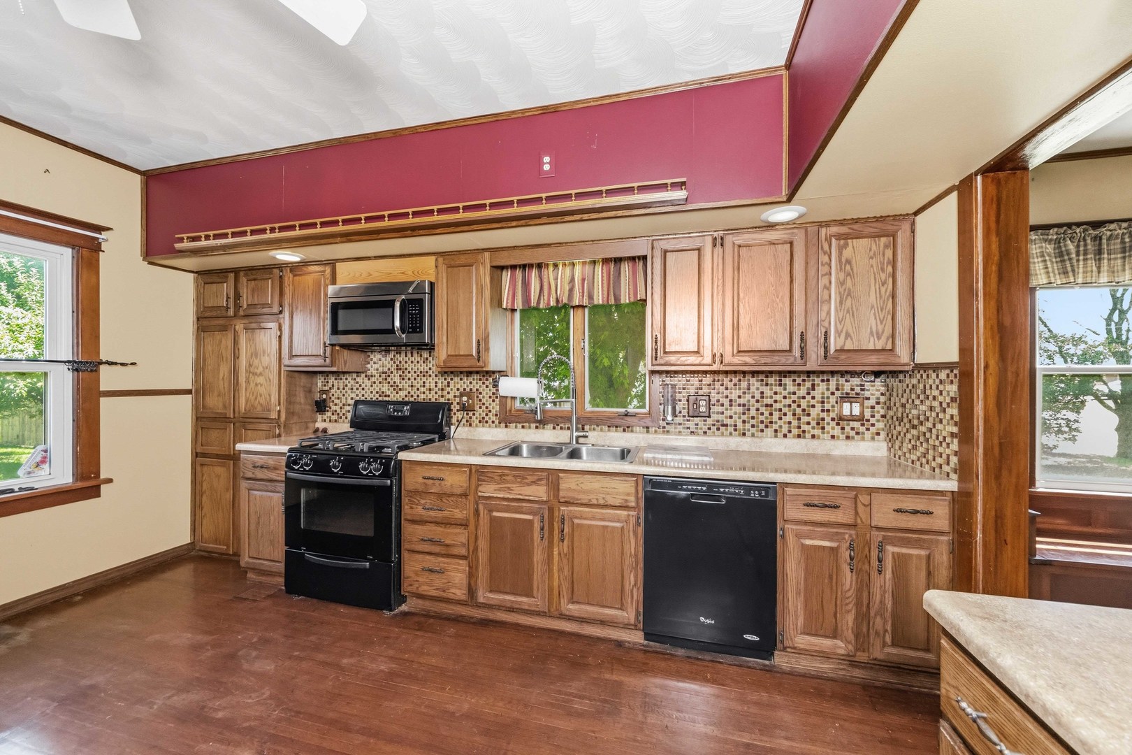 412 West 5th Street Minonk, IL 61760 - Photo 8 of 23 a kitchen with stainless steel appliances granite countertop a stove and a sink