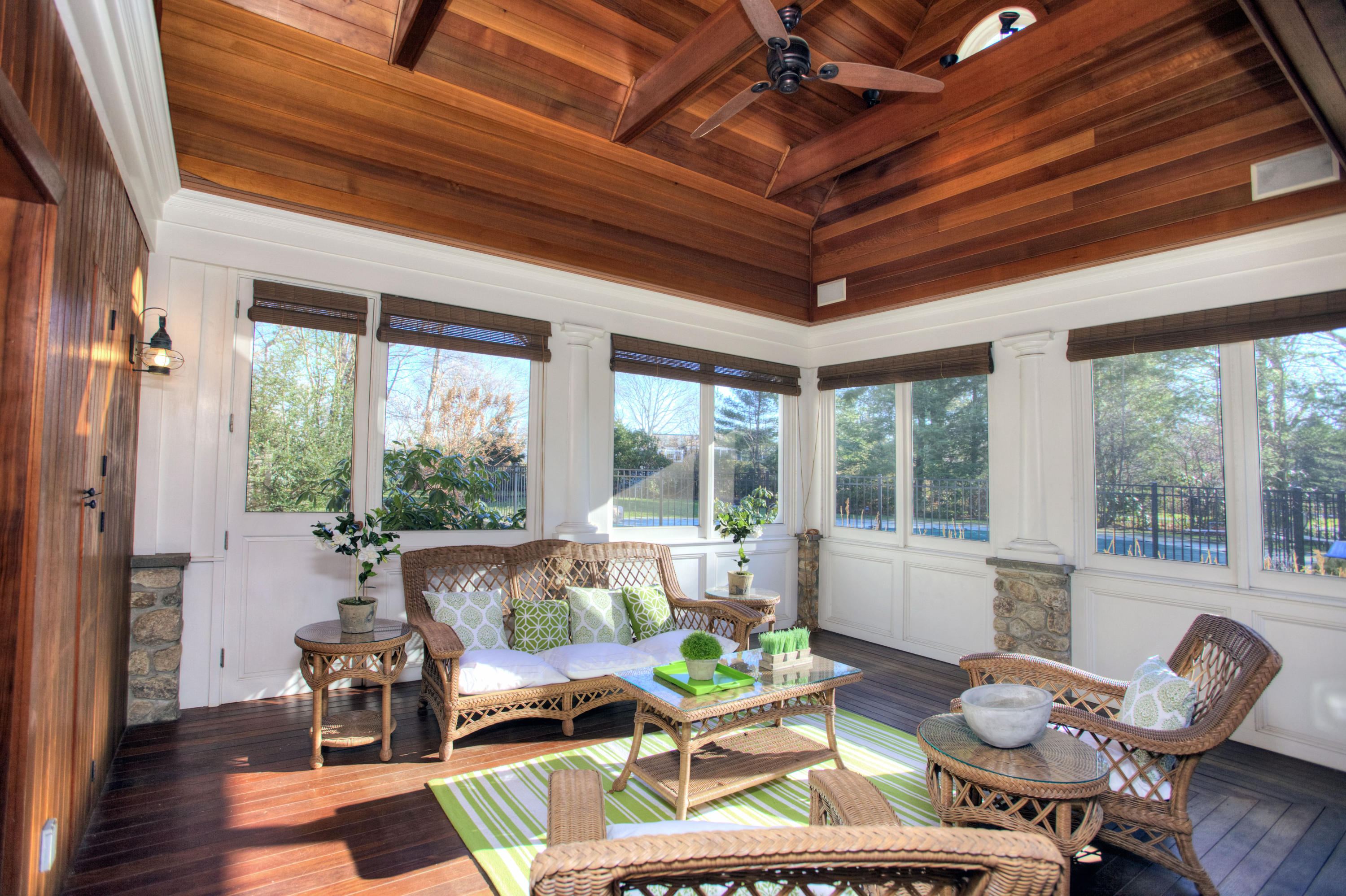 72 Ridge Acres Road Darien, CT 06820 - Photo 12 of 25 a living room with furniture a wooden floor and a large window