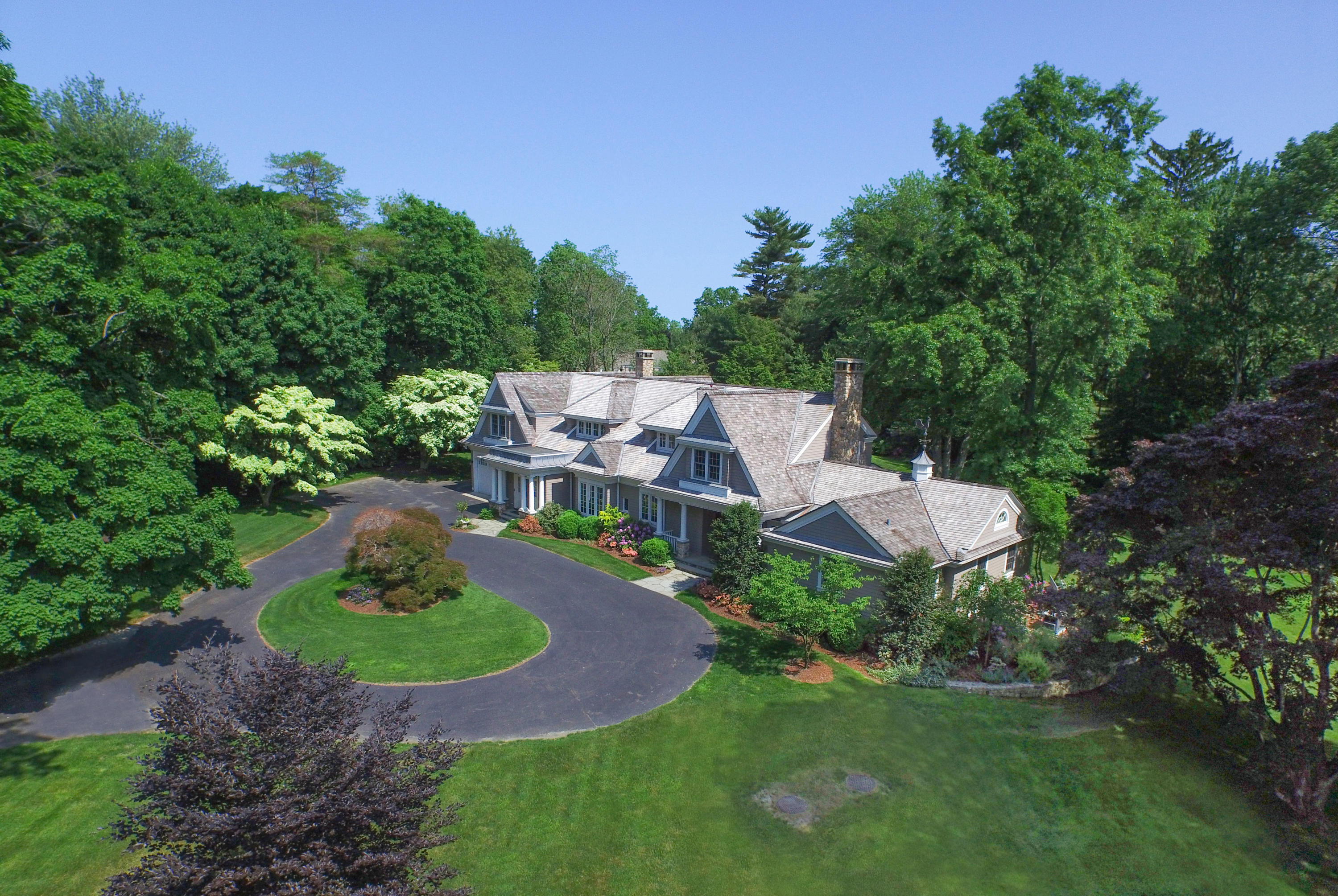 72 Ridge Acres Road Darien, CT 06820 - Photo 2 of 25 a garden view with a seating space