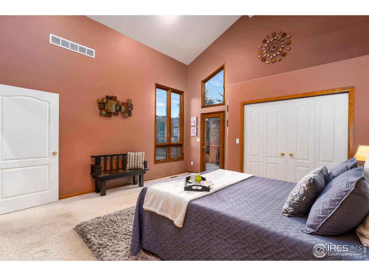350 Stove Prairie Road Bellvue, CO 80512 - Photo 10 of 24 a bedroom with a bed and a table