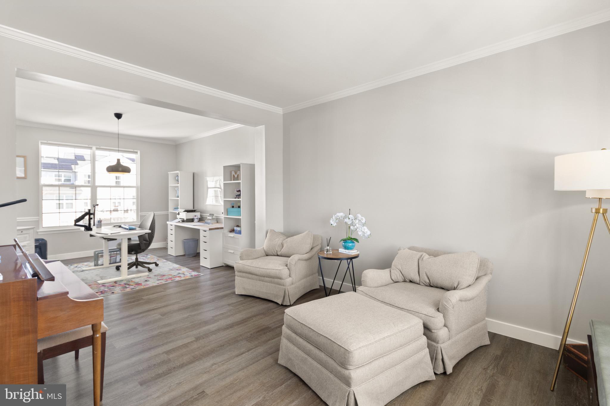 15911 Aerial View Road Woodbridge, VA 22193 - Photo 14 of 48 a living room with furniture and wooden floor