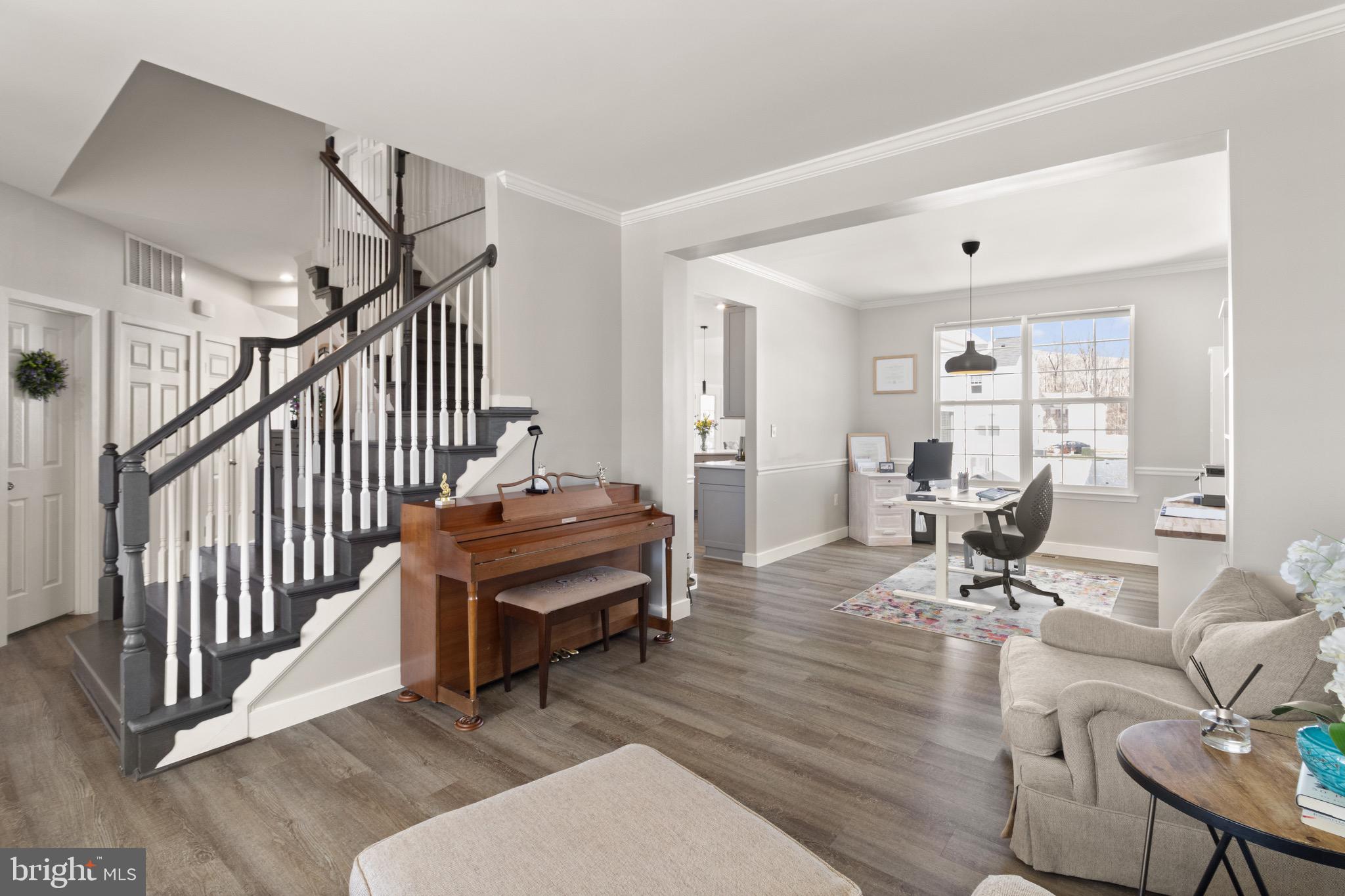 15911 Aerial View Road Woodbridge, VA 22193 - Photo 15 of 48 a living room with furniture and wooden floor