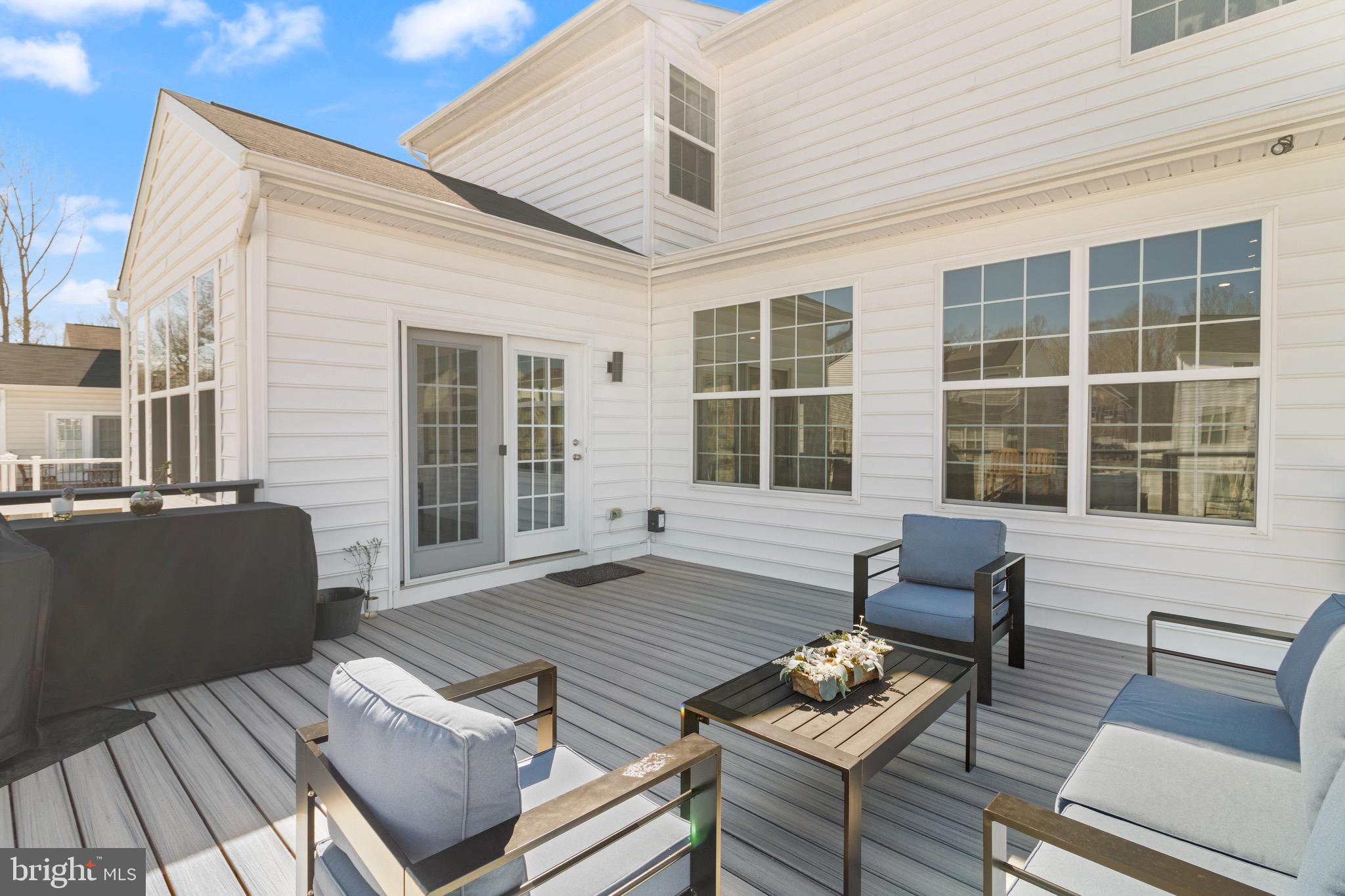 15911 Aerial View Road Woodbridge, VA 22193 - Photo 19 of 48 a outdoor living space with furniture and a window
