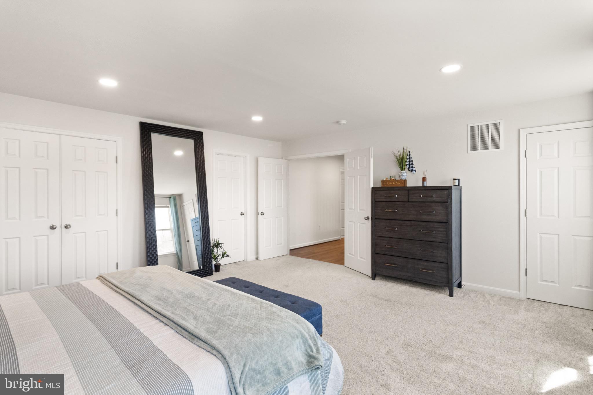 15911 Aerial View Road Woodbridge, VA 22193 - Photo 22 of 48 a bedroom with a bed and a closet