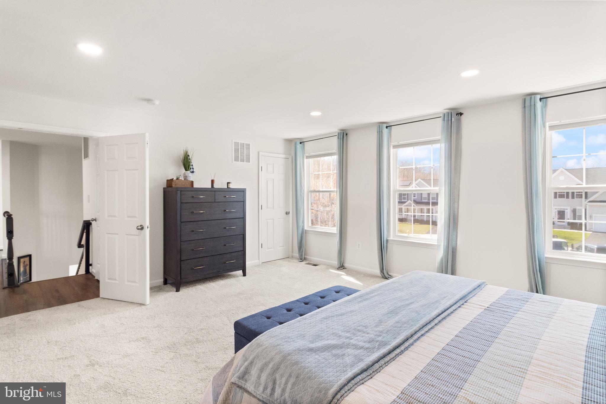 15911 Aerial View Road Woodbridge, VA 22193 - Photo 23 of 48 a spacious bedroom with a bed and a window