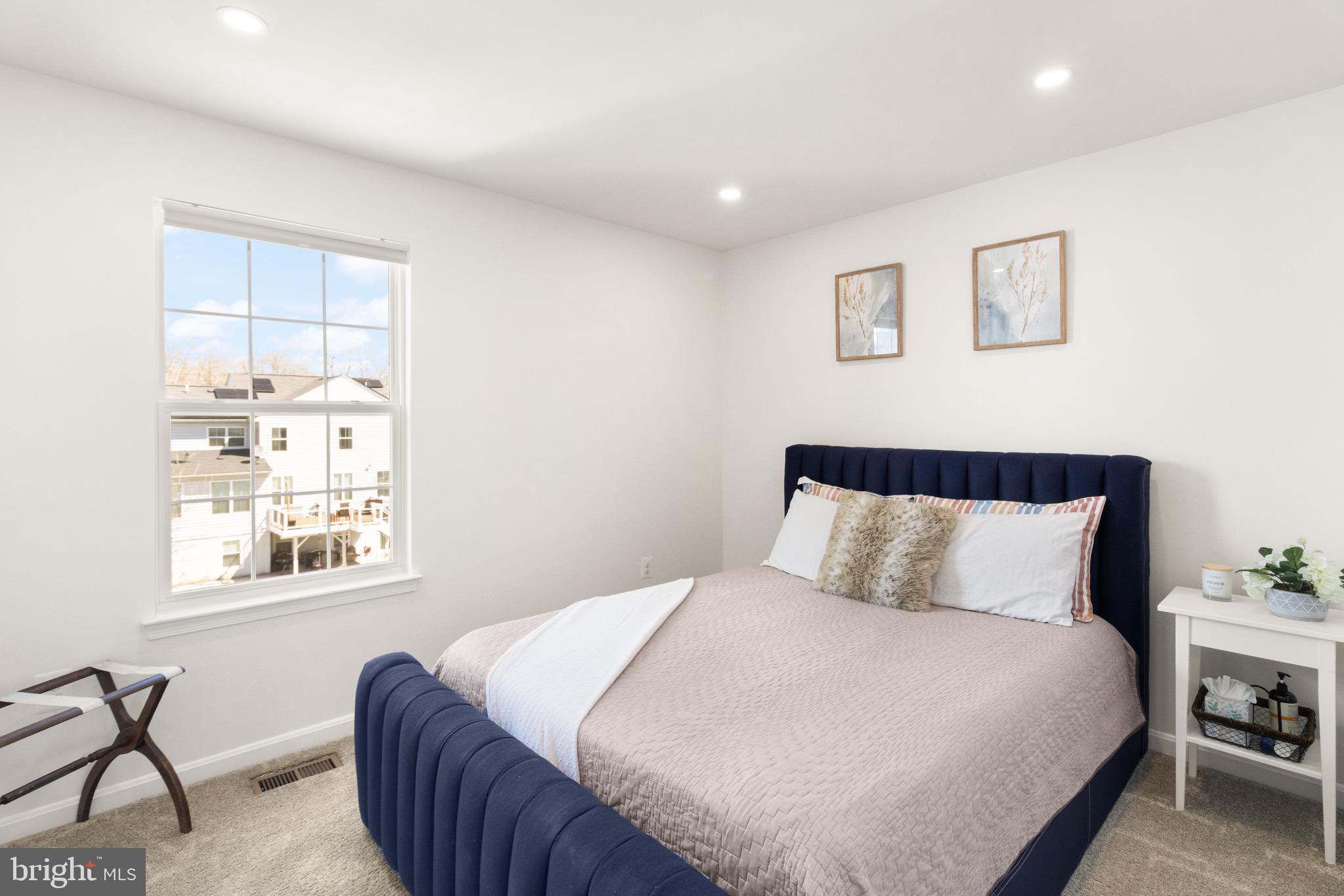 15911 Aerial View Road Woodbridge, VA 22193 - Photo 29 of 48 a bedroom with bed and window