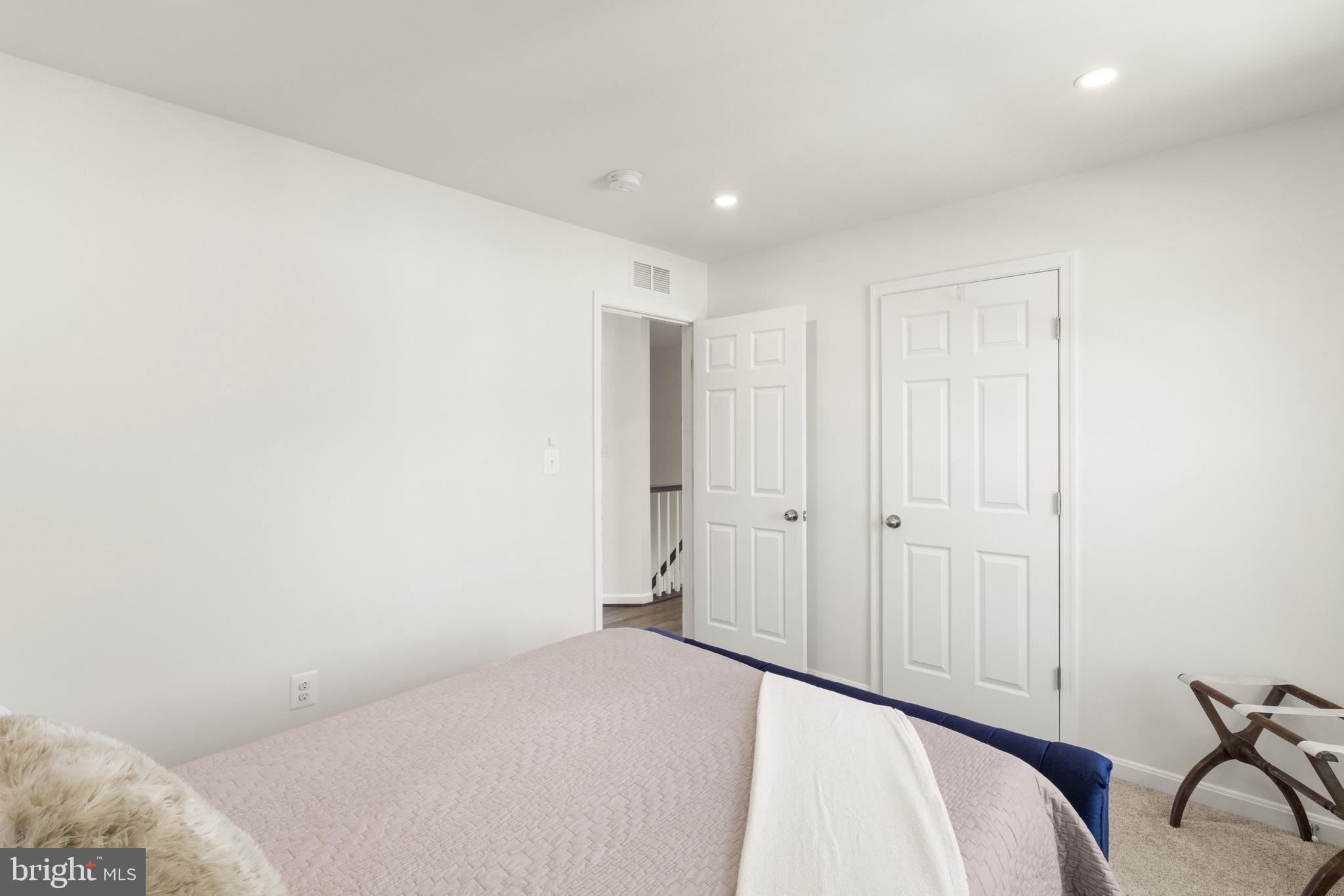 15911 Aerial View Road Woodbridge, VA 22193 - Photo 30 of 48 a bedroom with a bed and a bathroom