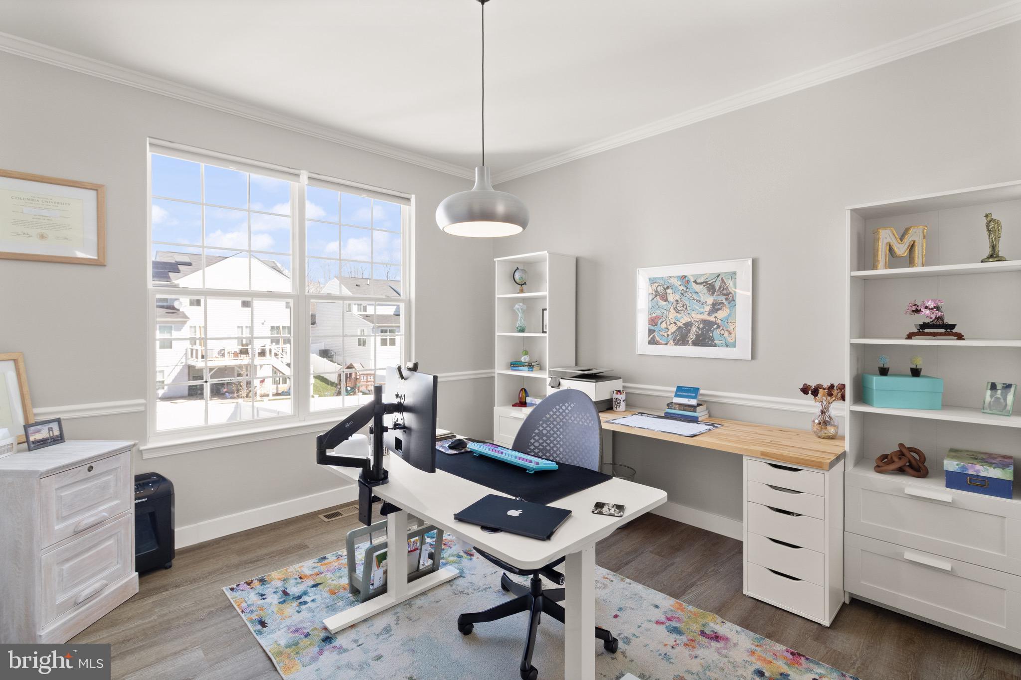 15911 Aerial View Road Woodbridge, VA 22193 - Photo 10 of 48 a work room with furniture a rug and a window