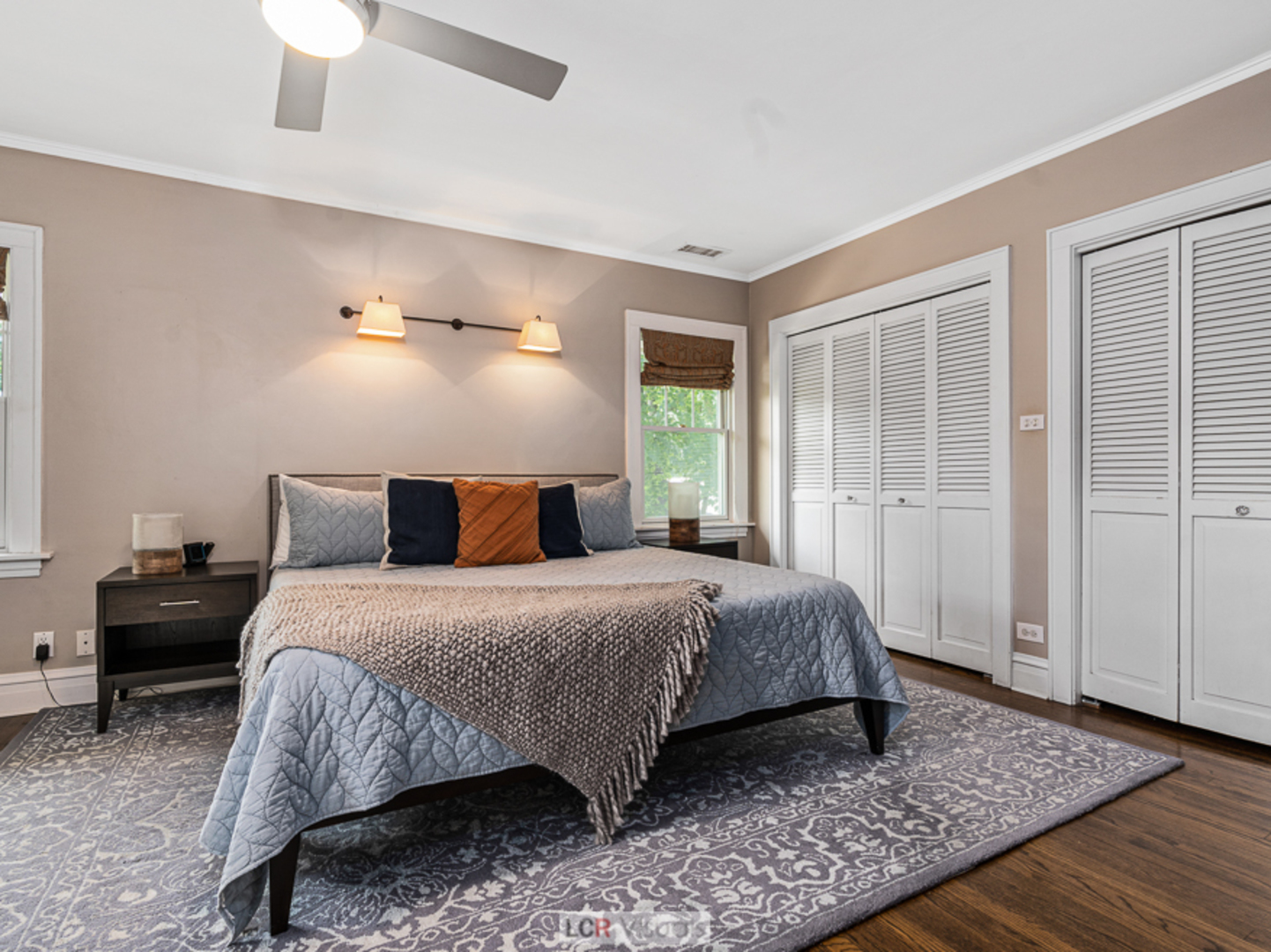 710 Bonnie Brae River Forest, IL 60305 - Photo 14 of 31 a bedroom with a bed and a chandelier