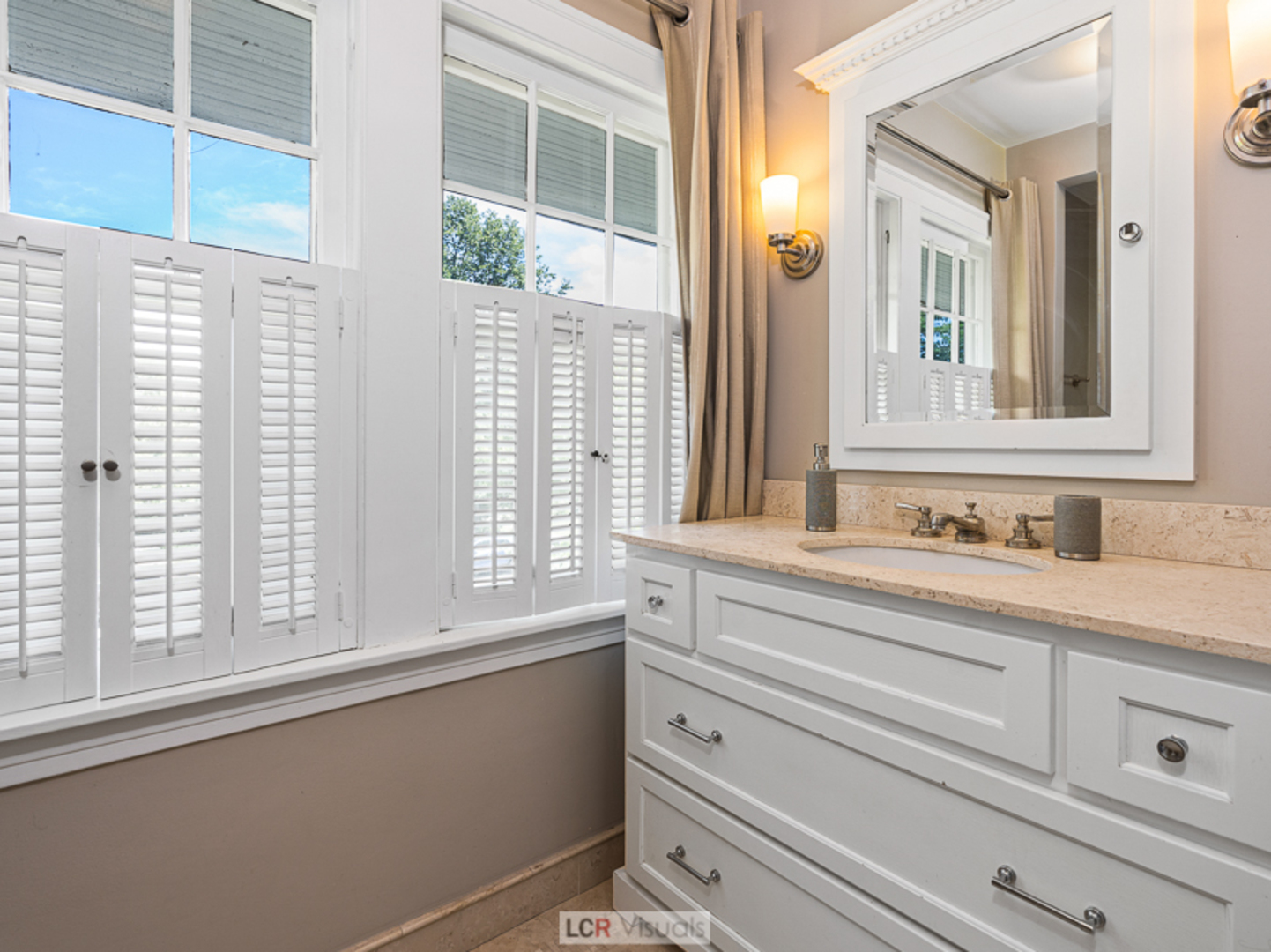 710 Bonnie Brae River Forest, IL 60305 - Photo 15 of 31 a bathroom with a sink and a window