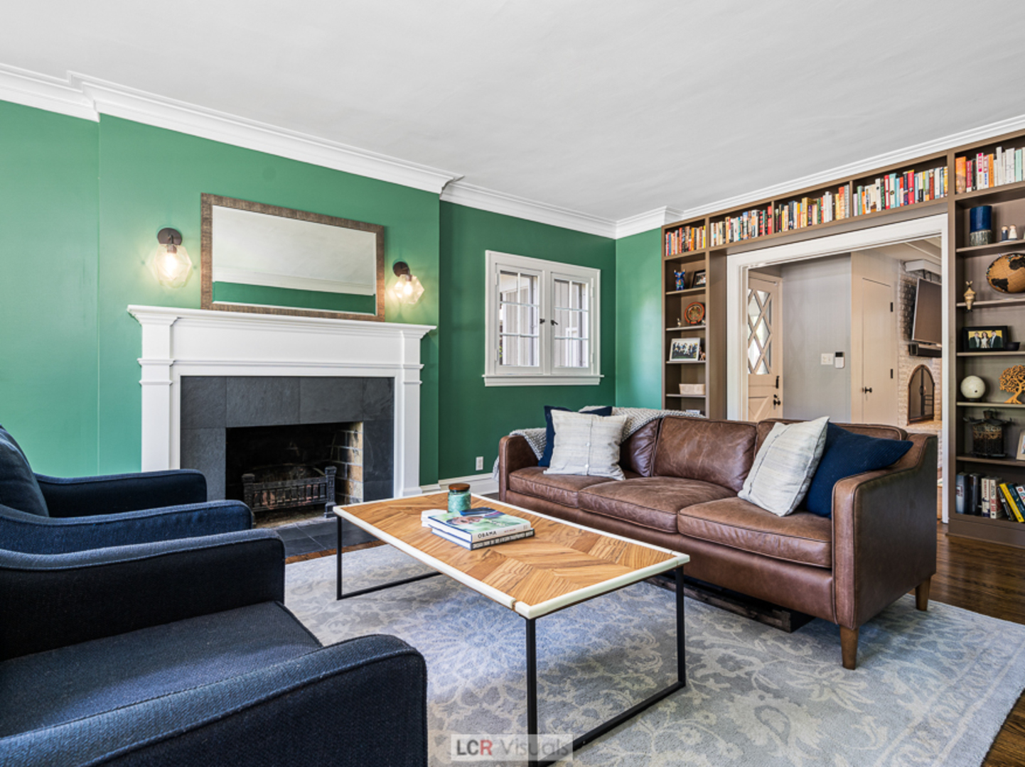 710 Bonnie Brae River Forest, IL 60305 - Photo 3 of 31 a living room with furniture and a fireplace