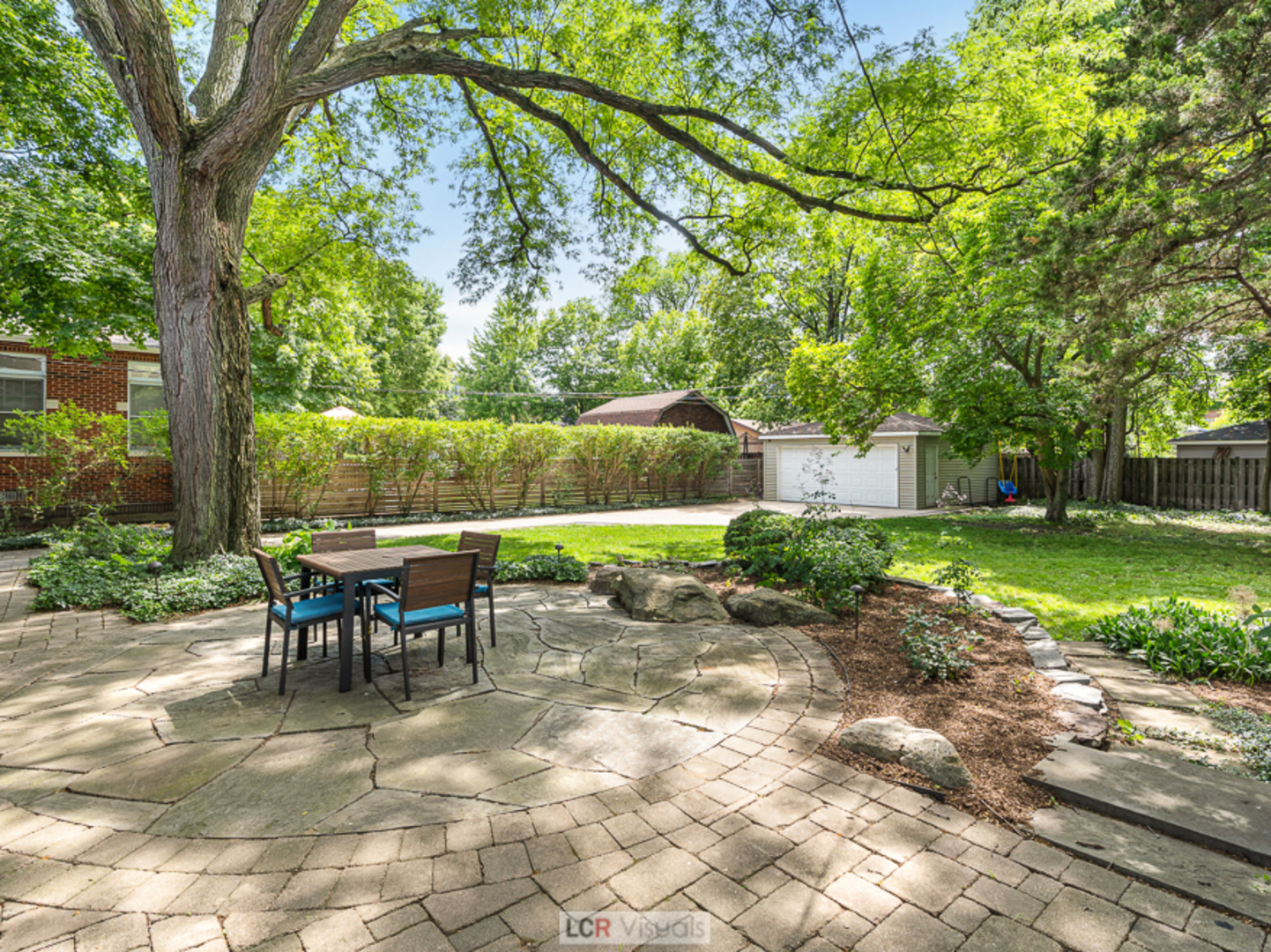 710 Bonnie Brae River Forest, IL 60305 - Photo 24 of 31 a view of a yard with a table and chairs in a yard