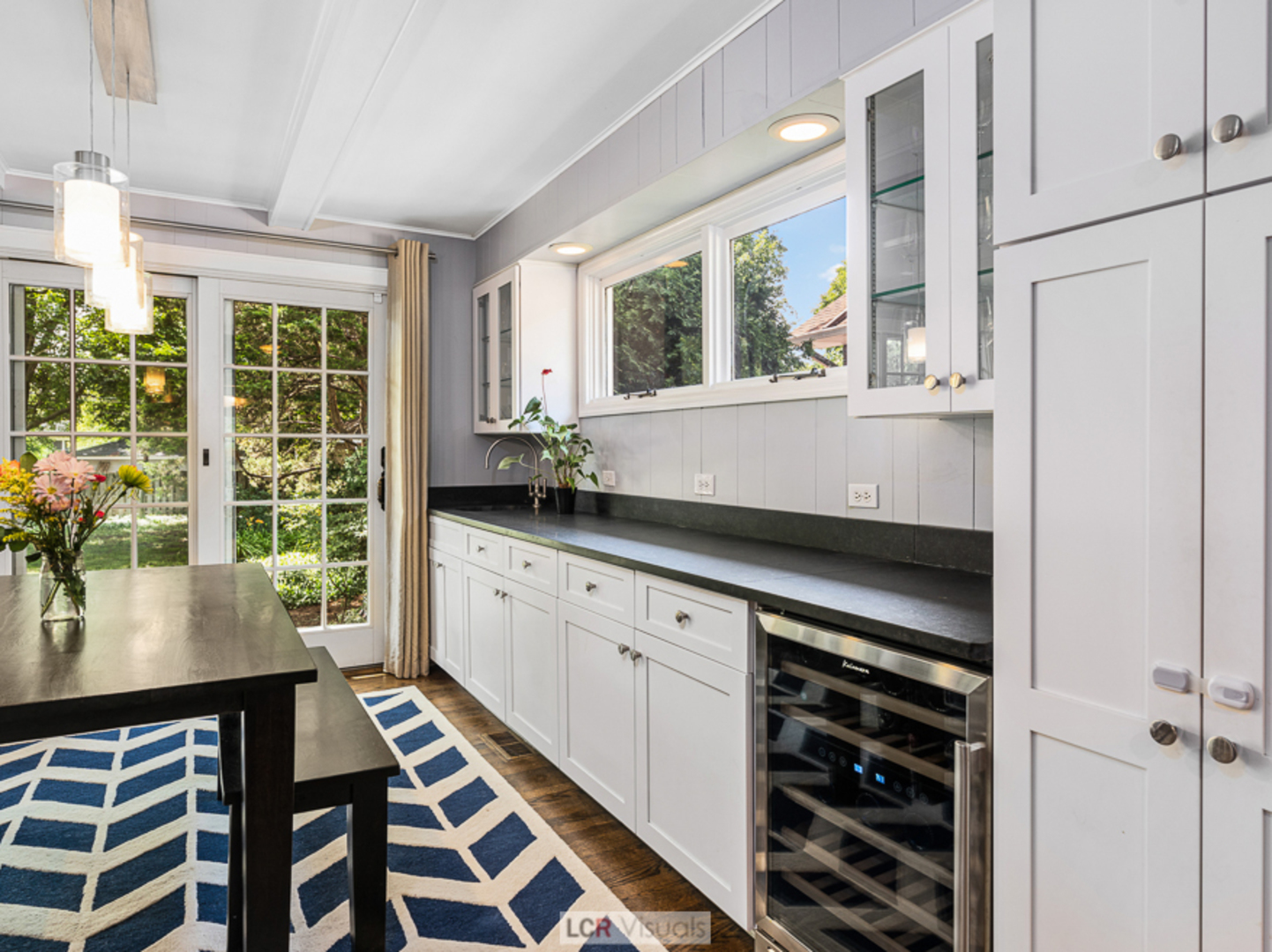 710 Bonnie Brae River Forest, IL 60305 - Photo 8 of 31 a kitchen with a stove a sink and a window